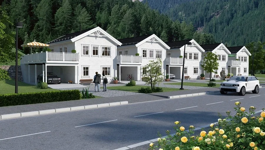 Fler rekkehus i hvitt tre med balkonger og parkering foran, omgitt av grønne trær og fjell i bakgrunnen.