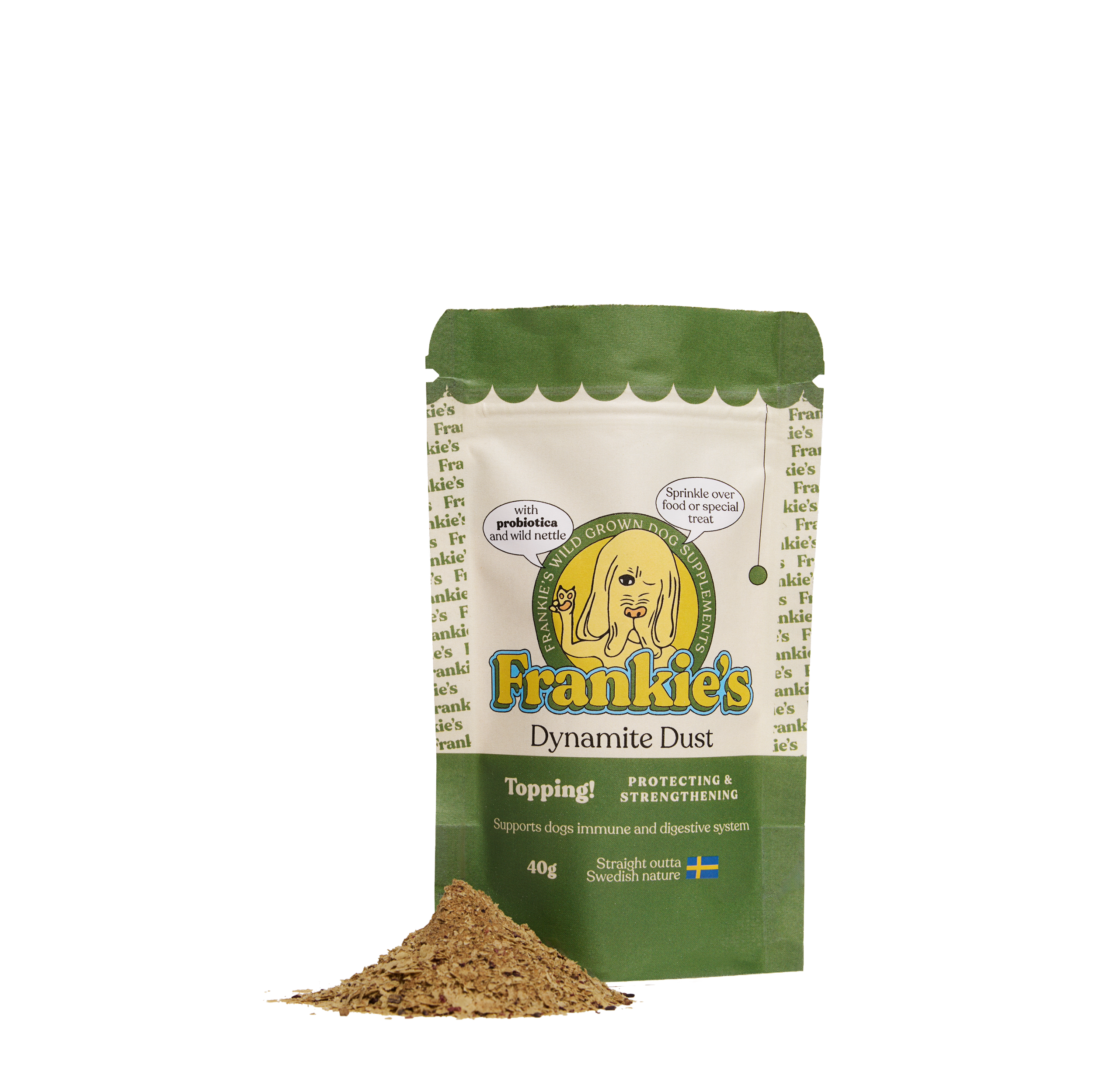 Packet of Frankie's Dynamite Dust dog supplement with a small pile of the powder in front of it. The packet is green and white with yellow and blue text, and features a cartoon dog illustration.
