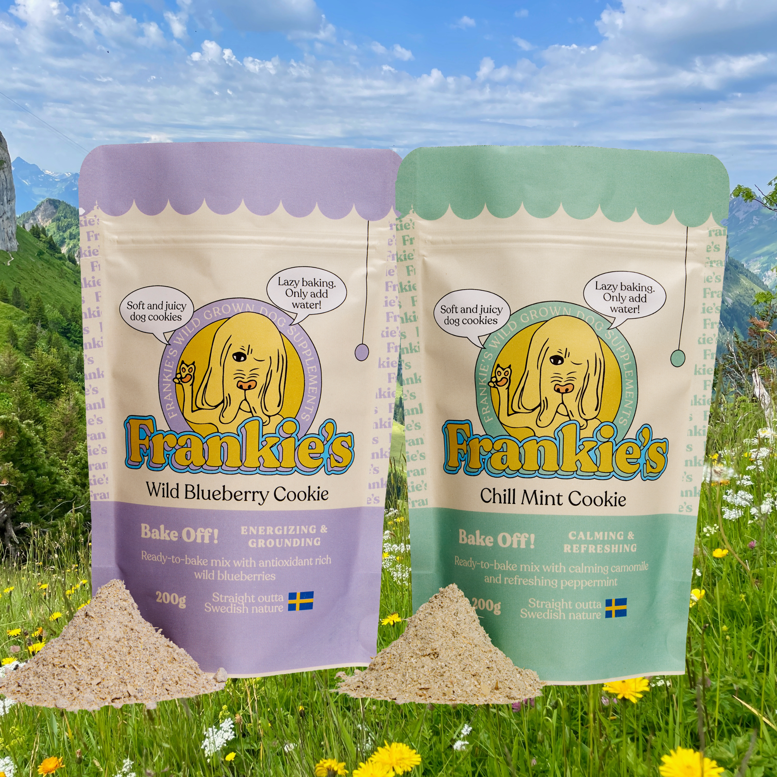Two illustrated cookie packages from Frankie's, on green grass with yellow flowers, mountains, trees, and a blue sky in the background. The left package is purple, labeled 'Wild Blueberry Cookie', and the right package is green, labeled 'Chill Mint Cookie'. Both packages feature a drawing of a dog and are marked with Swedish flag icons.