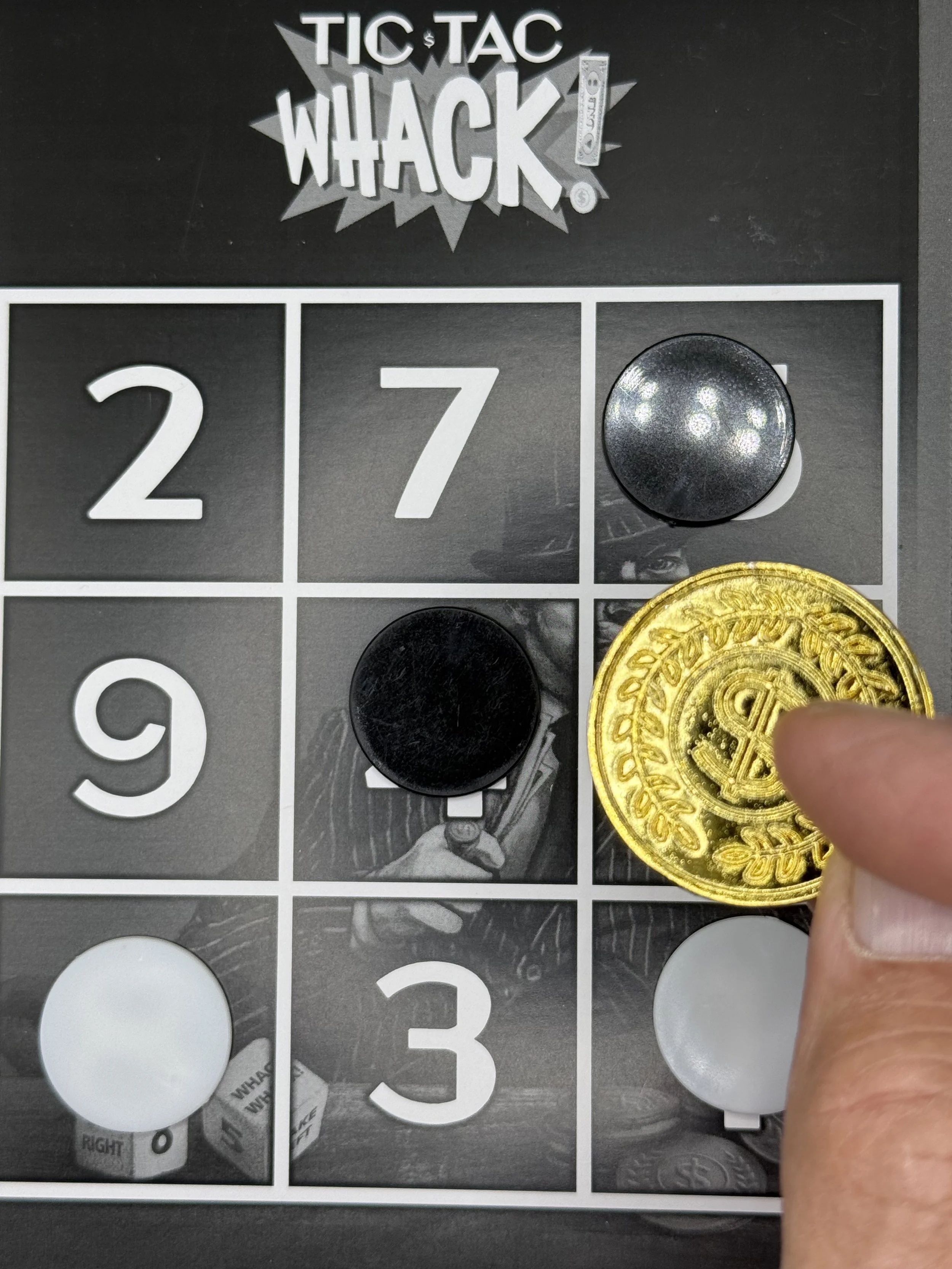 TTT w Hand Gold Coin.jpeg