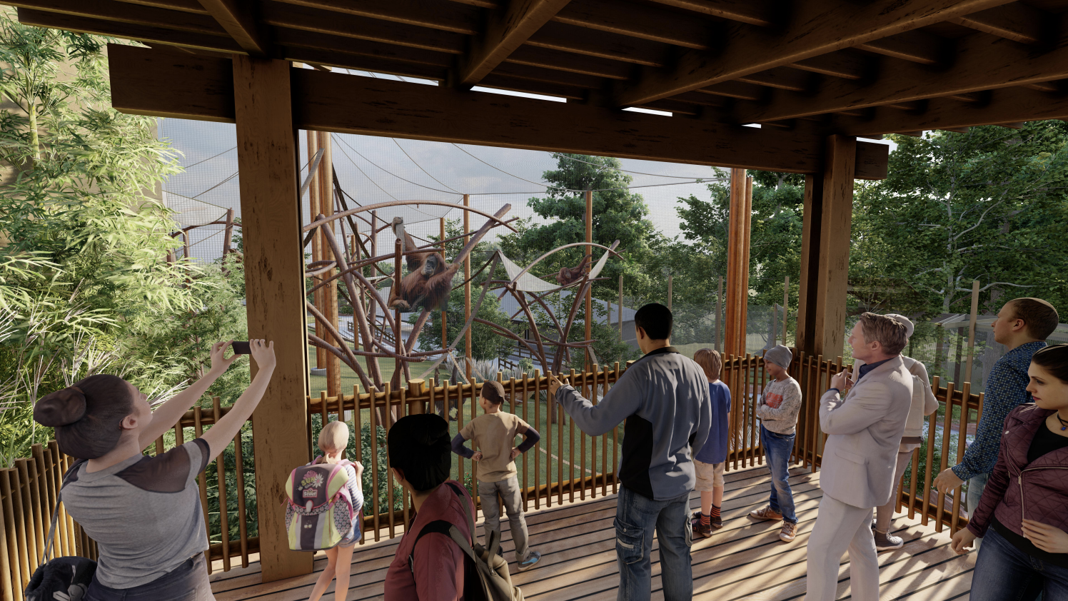 Visitors watch monkeys in a zoo enclosure with climbing structures and trees, viewed from a covered wooden deck.