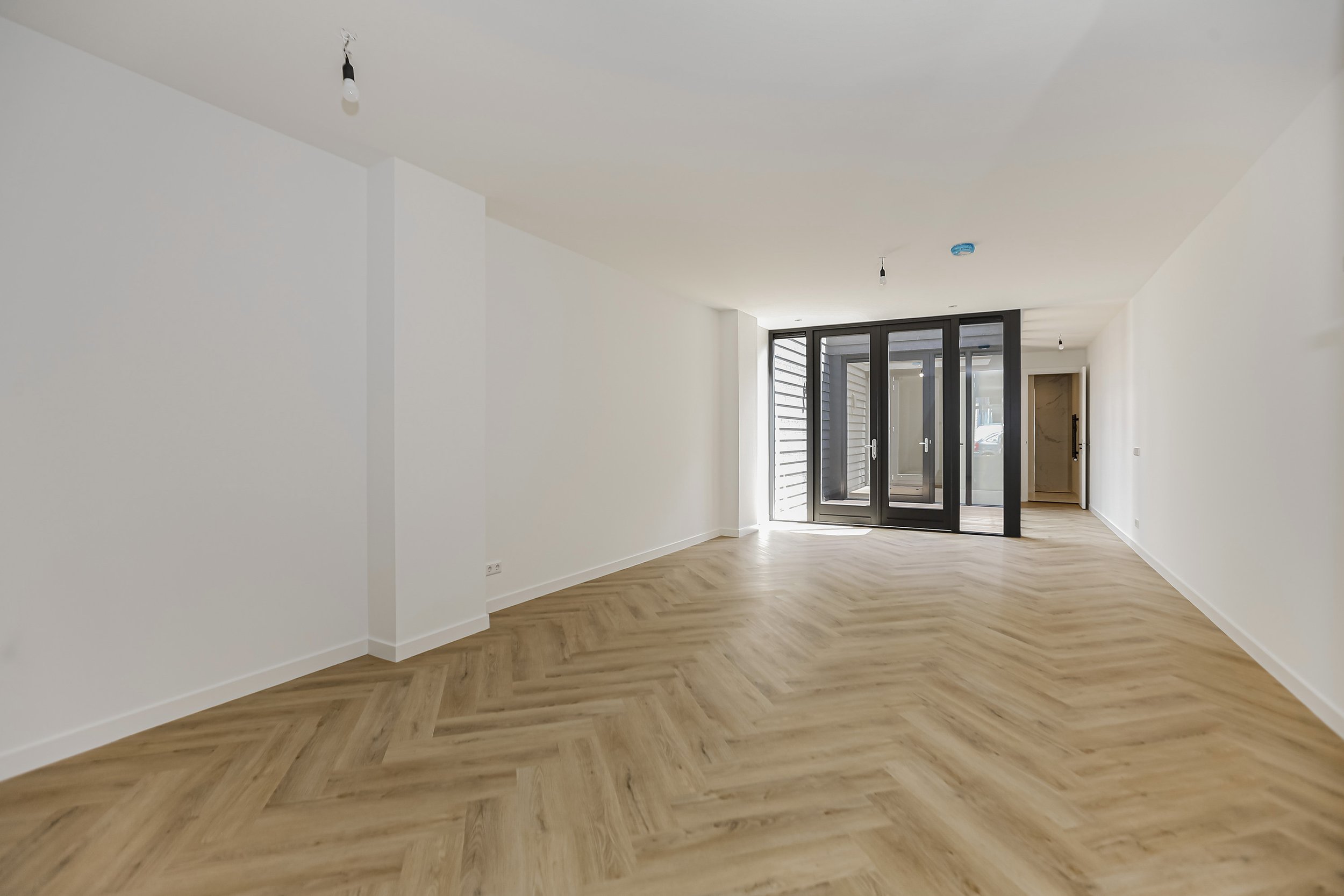 Aankoop winkel- en woonruimte, transformatie naar 4 appartementen - Paradijs 18-20, Gouda