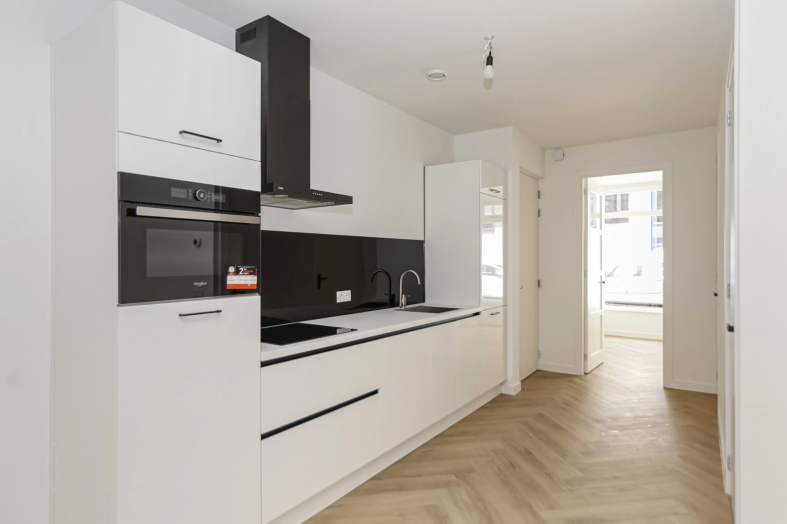 Aankoop winkel- en woonruimte, transformatie naar 4 appartementen - Paradijs 18-20, Gouda