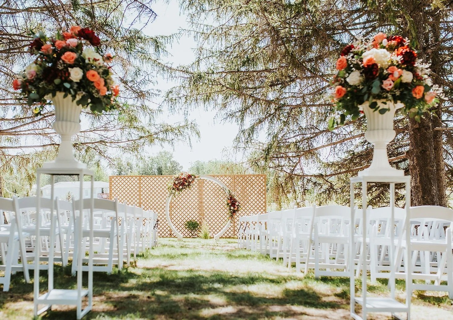 Coral pink white and burgundy wedding flowers