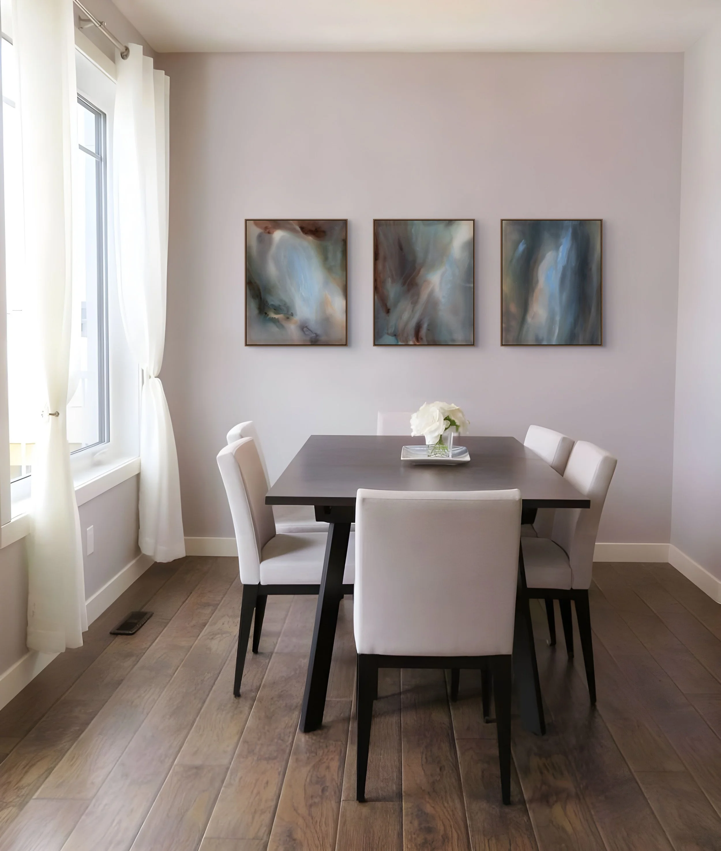Settle I, Settle II and Settle III by Katerina Gordeeva displayed together on a wall in a contemporary interior.