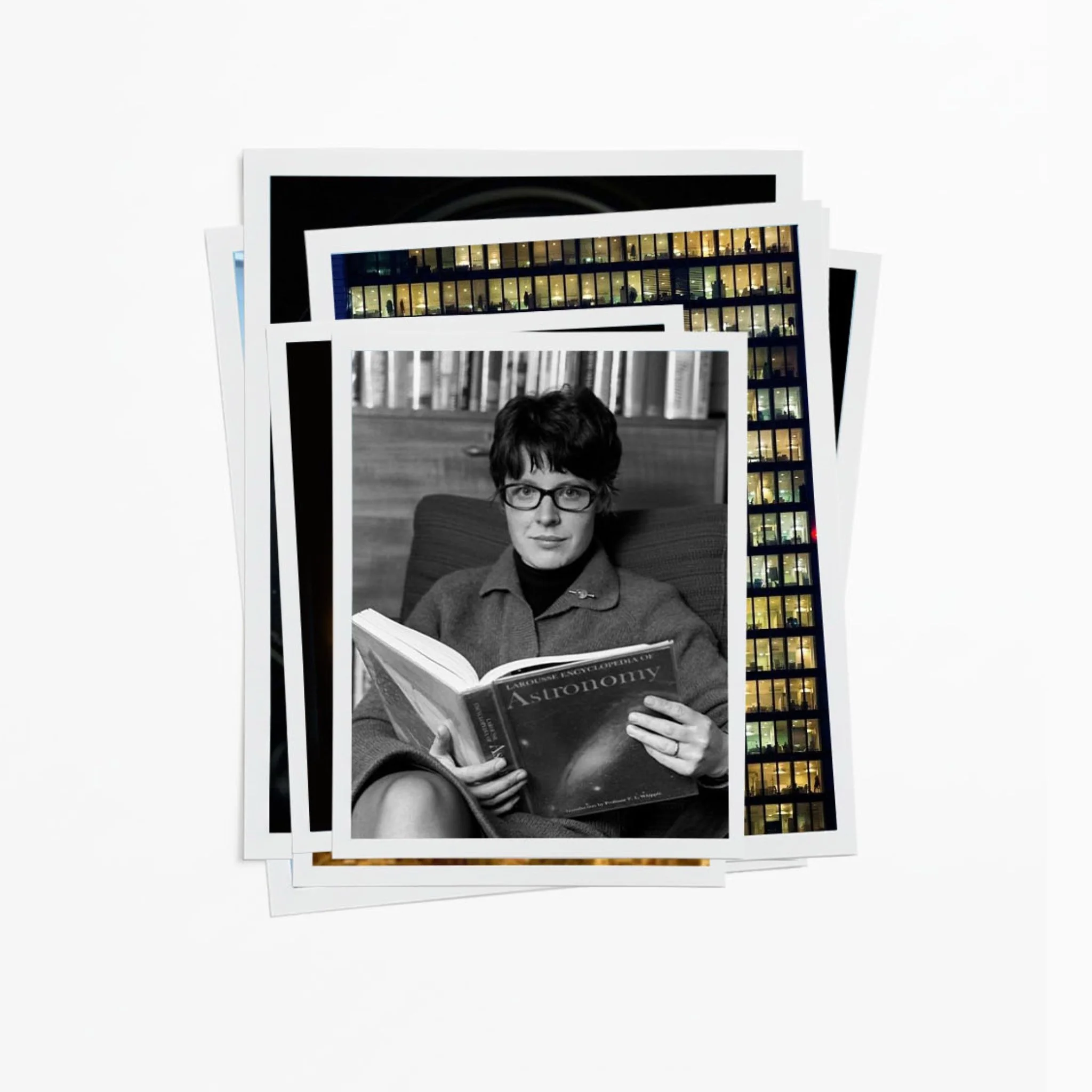 A stack of photographs, with a black and white photo of a woman, Jocelyn Bell Burnell, with glasses, reading an astronomy book. Inspiration from FW25 mpower collection.