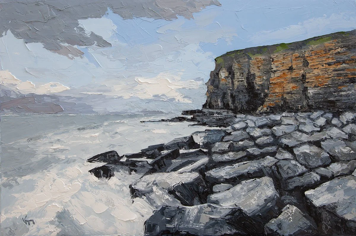 Oil painting of a coastal scene with large rocky shoreline, high cliffs with layers of sediment, the ocean, and a cloudy sky in wales
