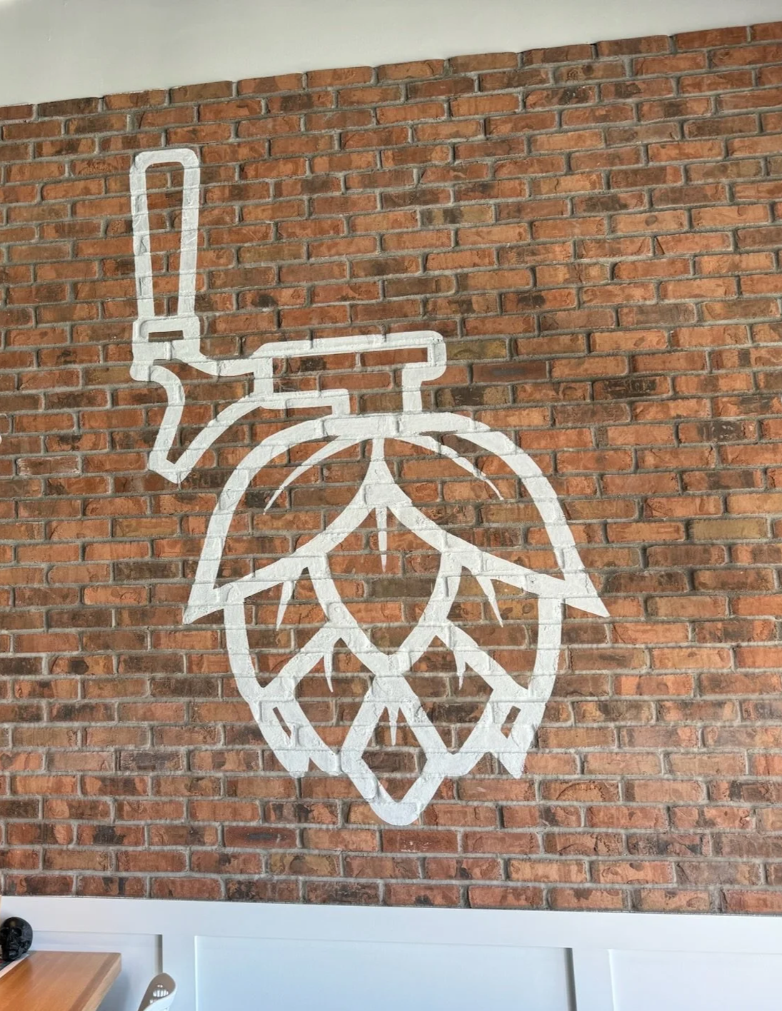 Hand Painted logo on brick