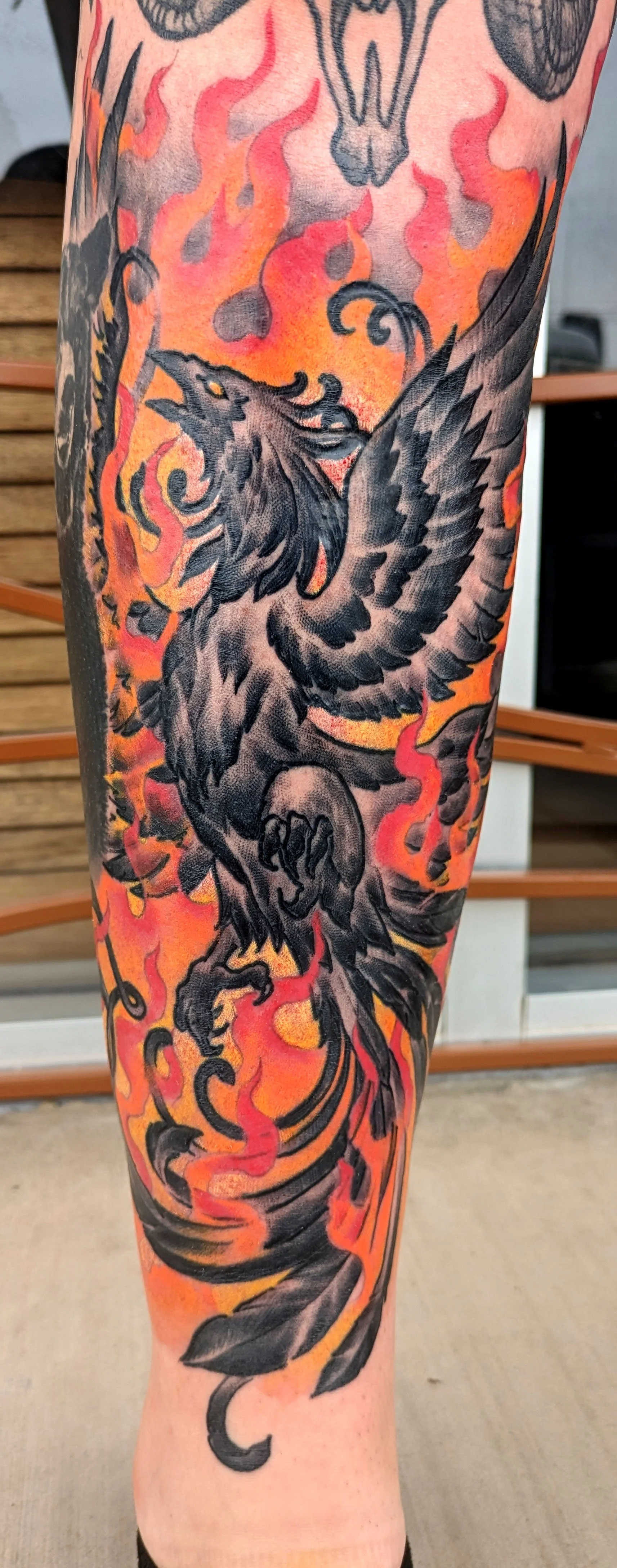 Neo-traditional phoenix tattoo