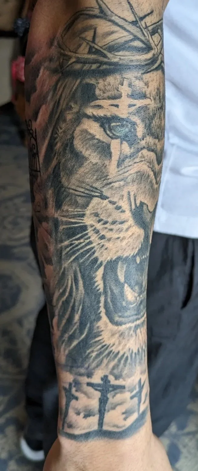 Black & Grey lion Jesus tattoo