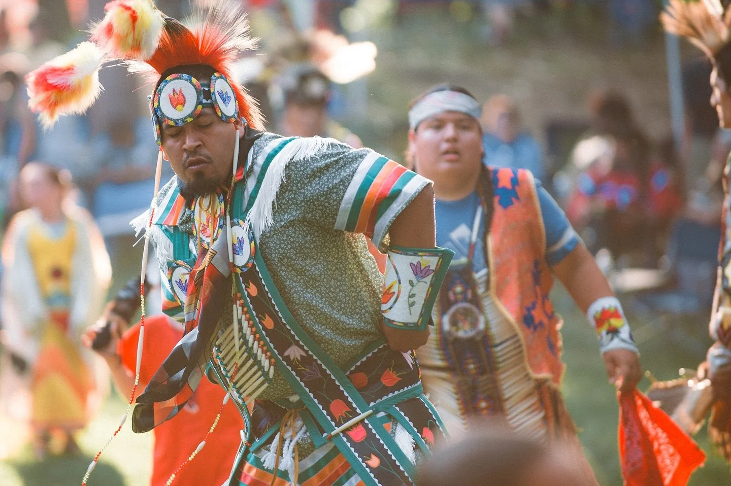 original american heroes dance in color, carry the songs, and hold the land