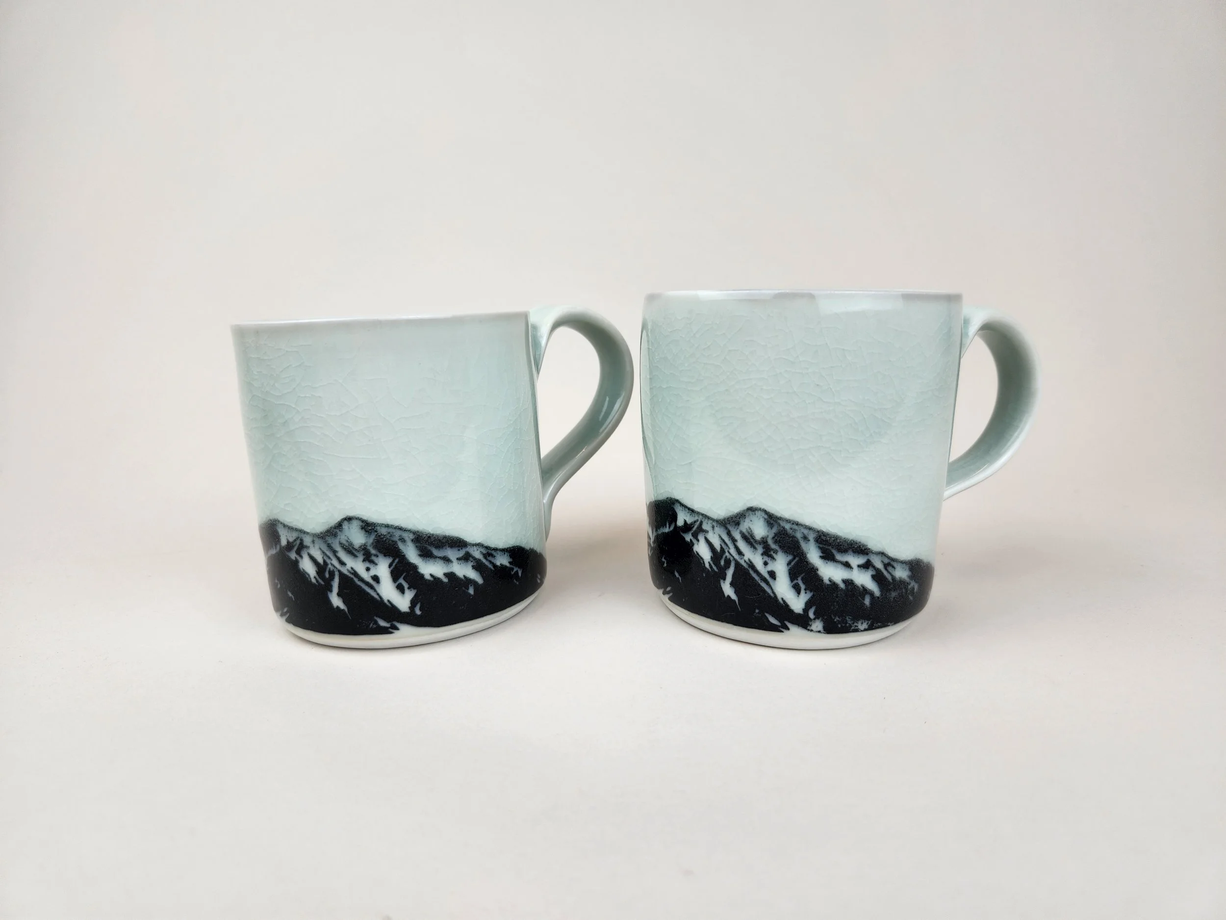 Mount Sopris decal illustrations by Elise Hillbrand. Pottery by Anne Goldberg.