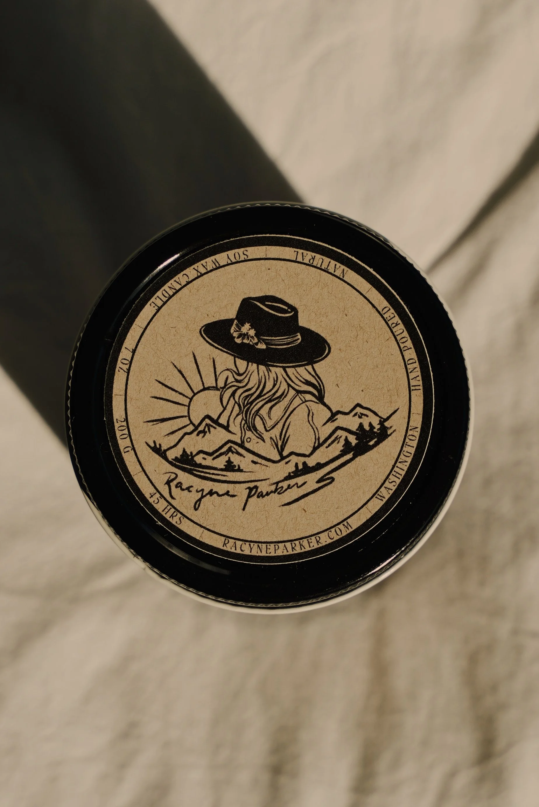 racyne candle lid.jpg