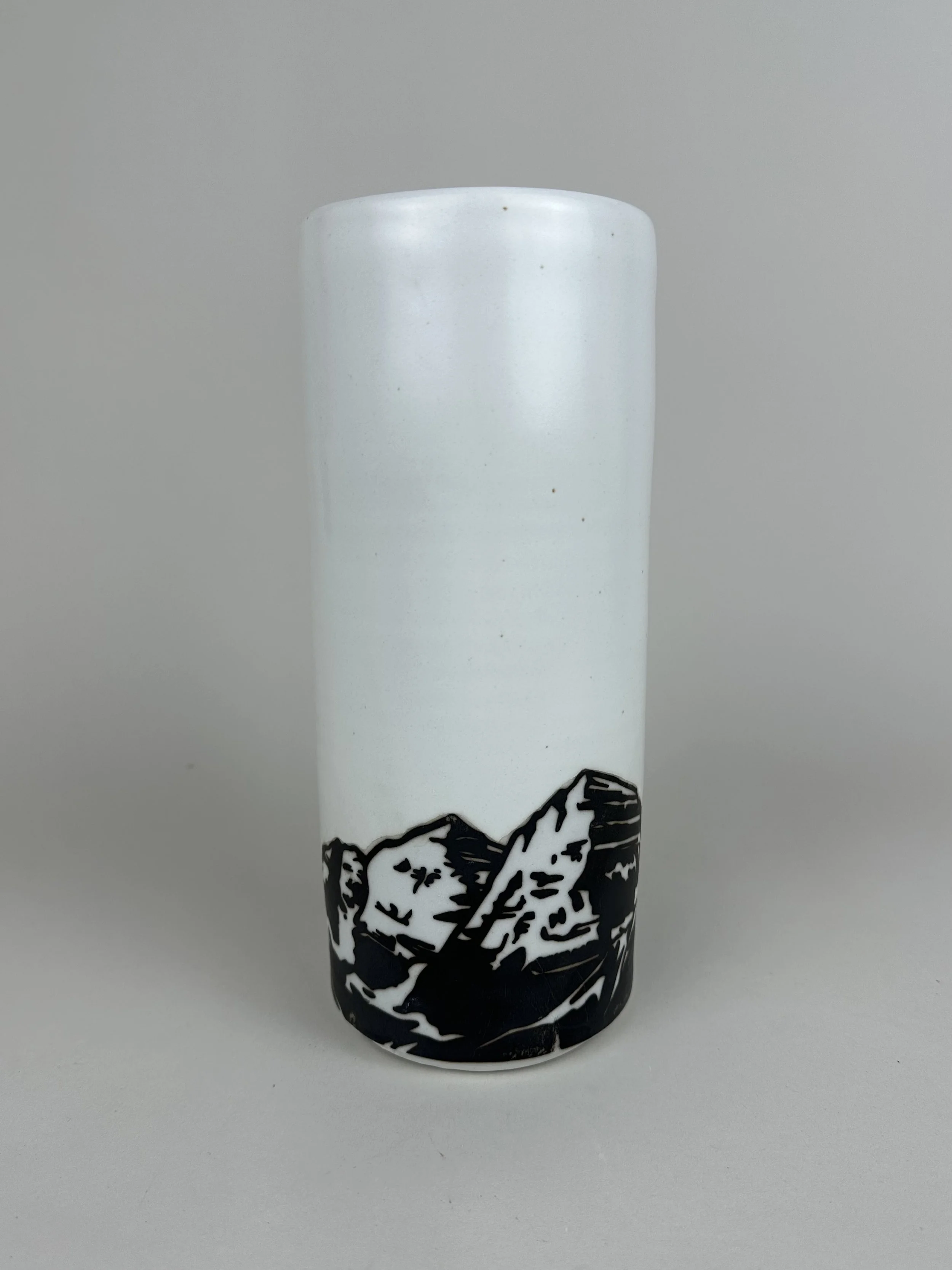 Maroon Bells decal illustrations by Elise Hillbrand. Pottery by Anne Goldberg.