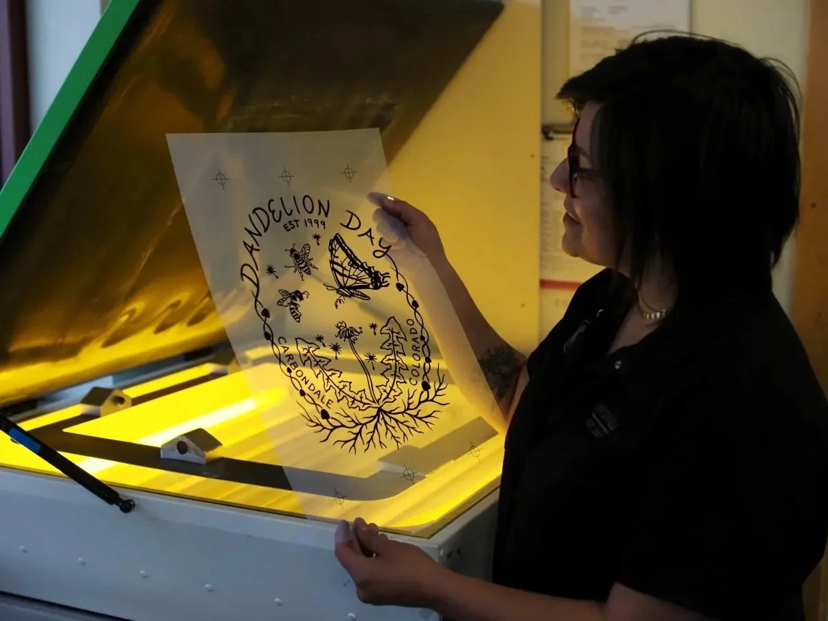 Shirts & hats were printed and embroidered locally by Inkswell Printers. Photo by Raleigh Burleigh.