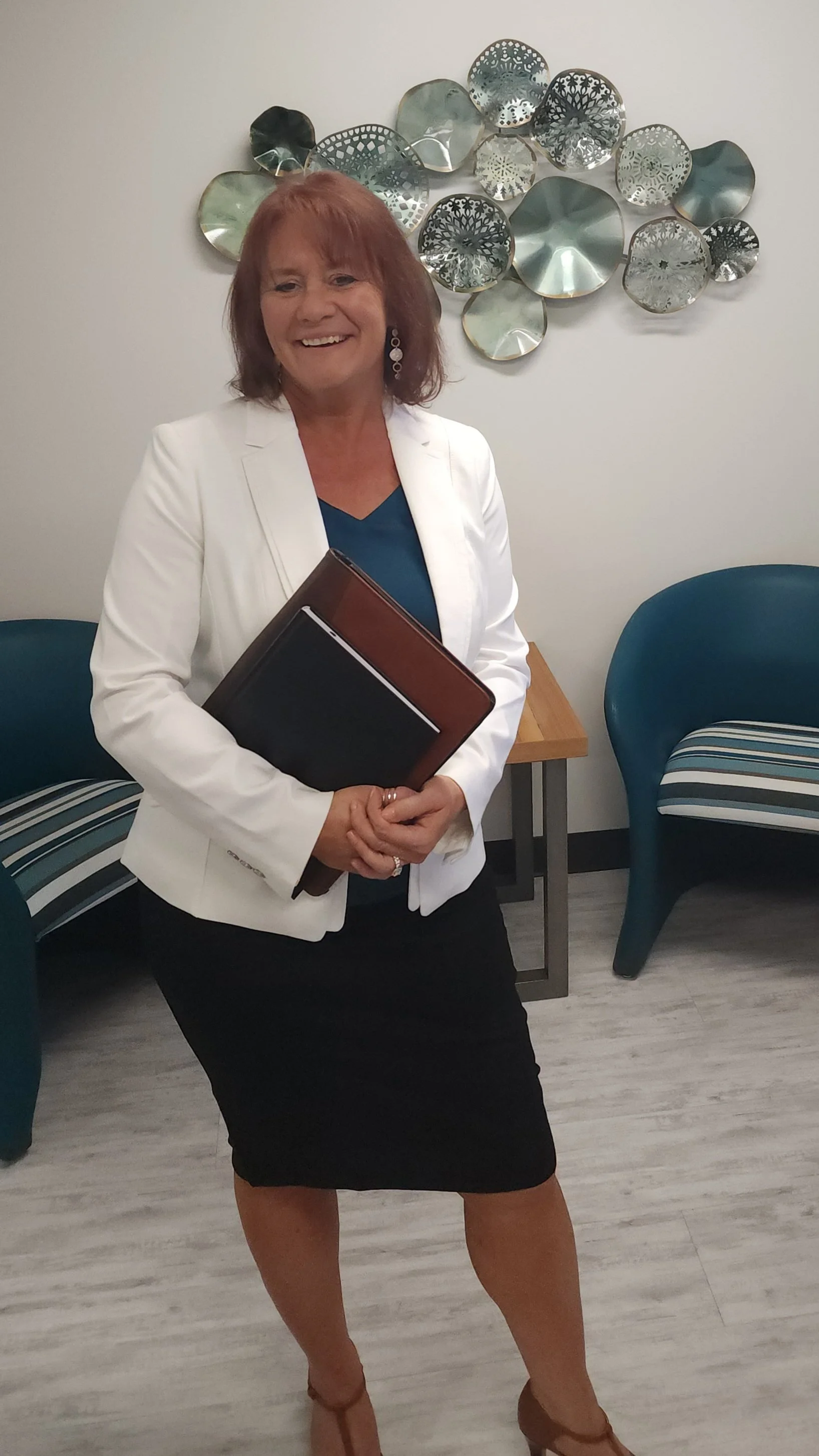 Cheri, founder of Congruent Coaching, smiling in a professional portrait that reflects her supportive approach and enthusiasm for career coaching consultations