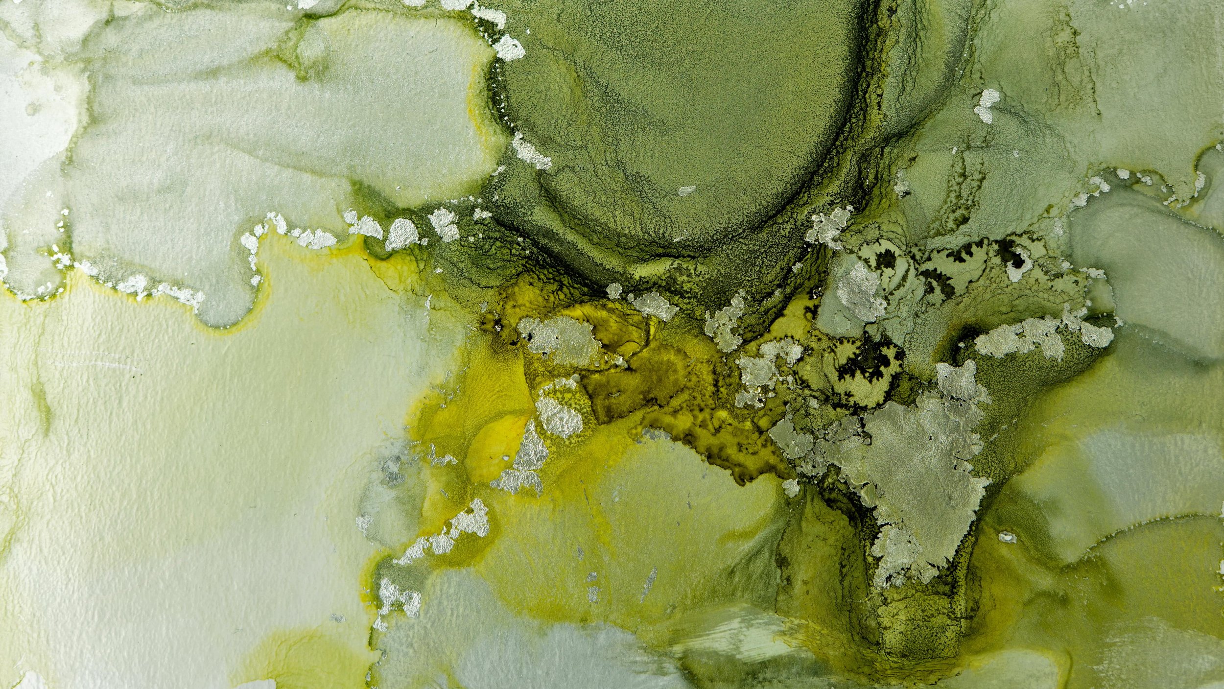 Abstract watercolor painting in shades of green, yellow, black, and silver with flowing, organic shapes and textures.