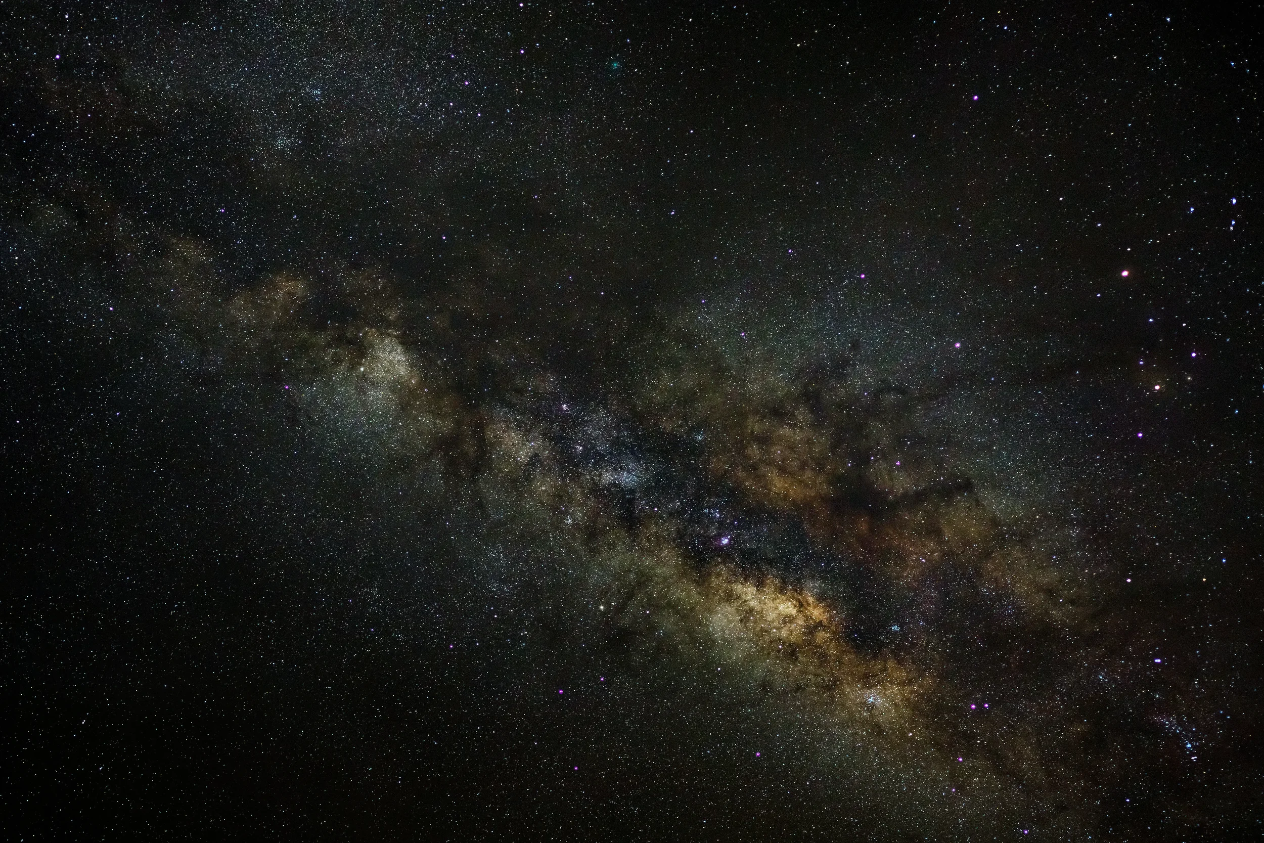 Clear night sky showing the dense star field and band of the Milky Way galaxy.