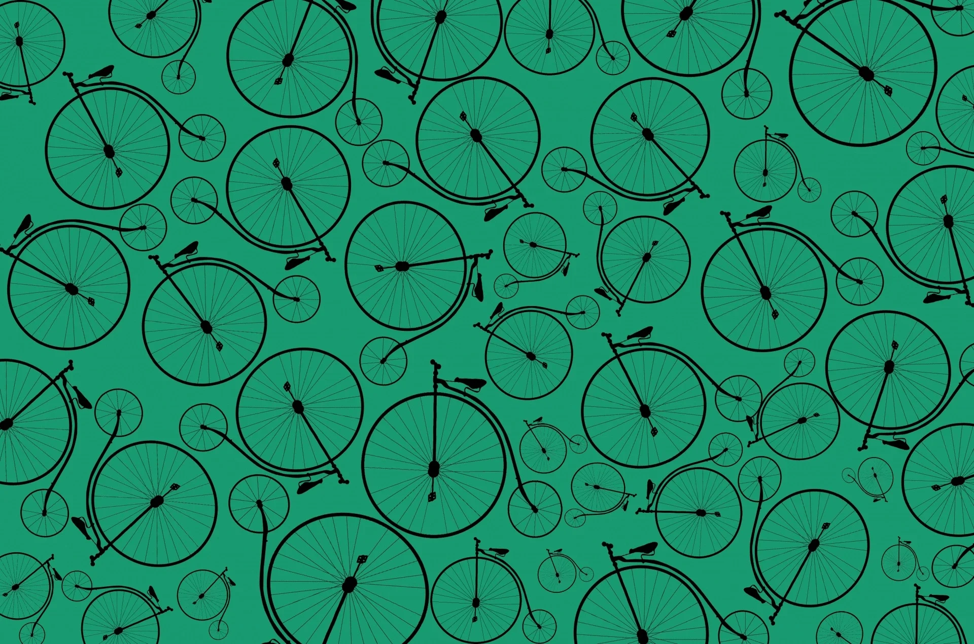 Pattern of black outlined bicycles on a green background.