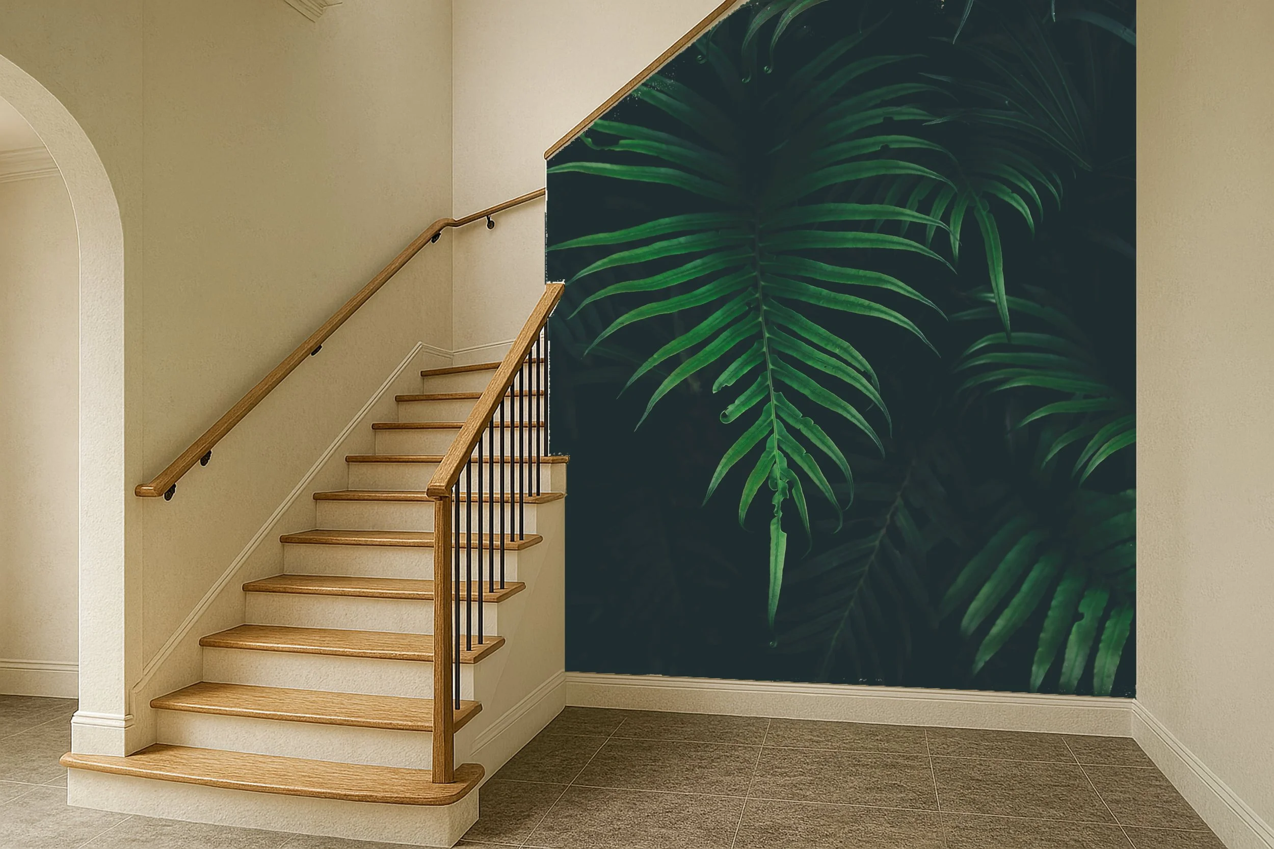 Interior staircase with wooden steps, black metal railing, and a large wall mural of green tropical leaves.