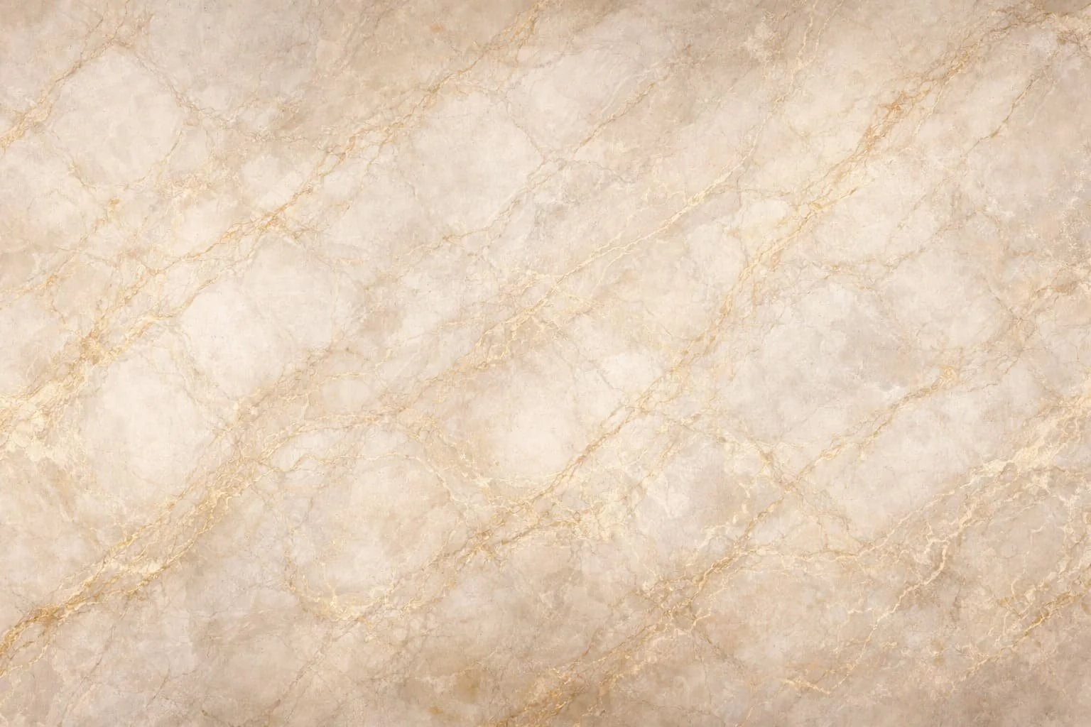 A beige marble surface with light and dark veining.