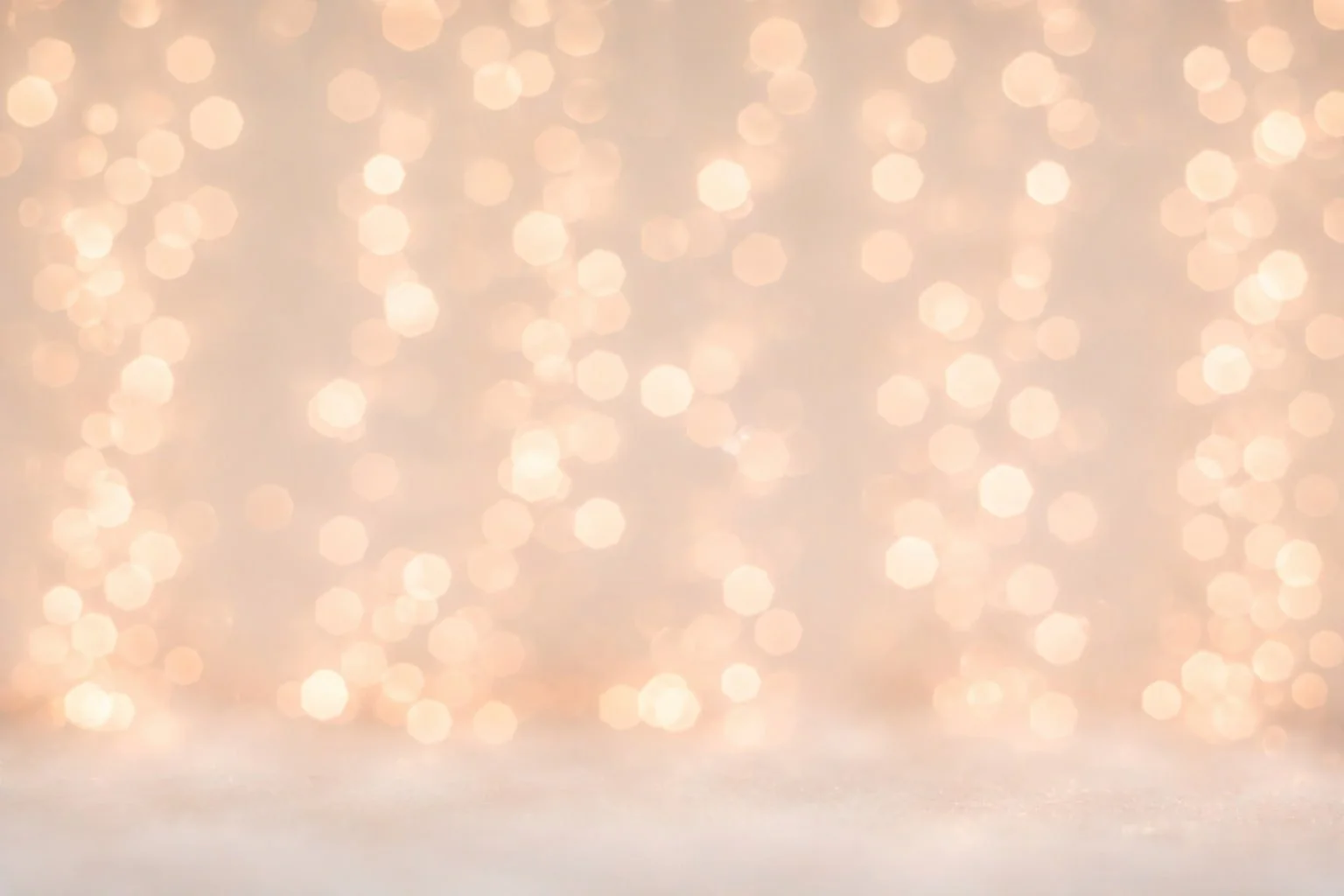 Blurred warm-toned background with bokeh light effects