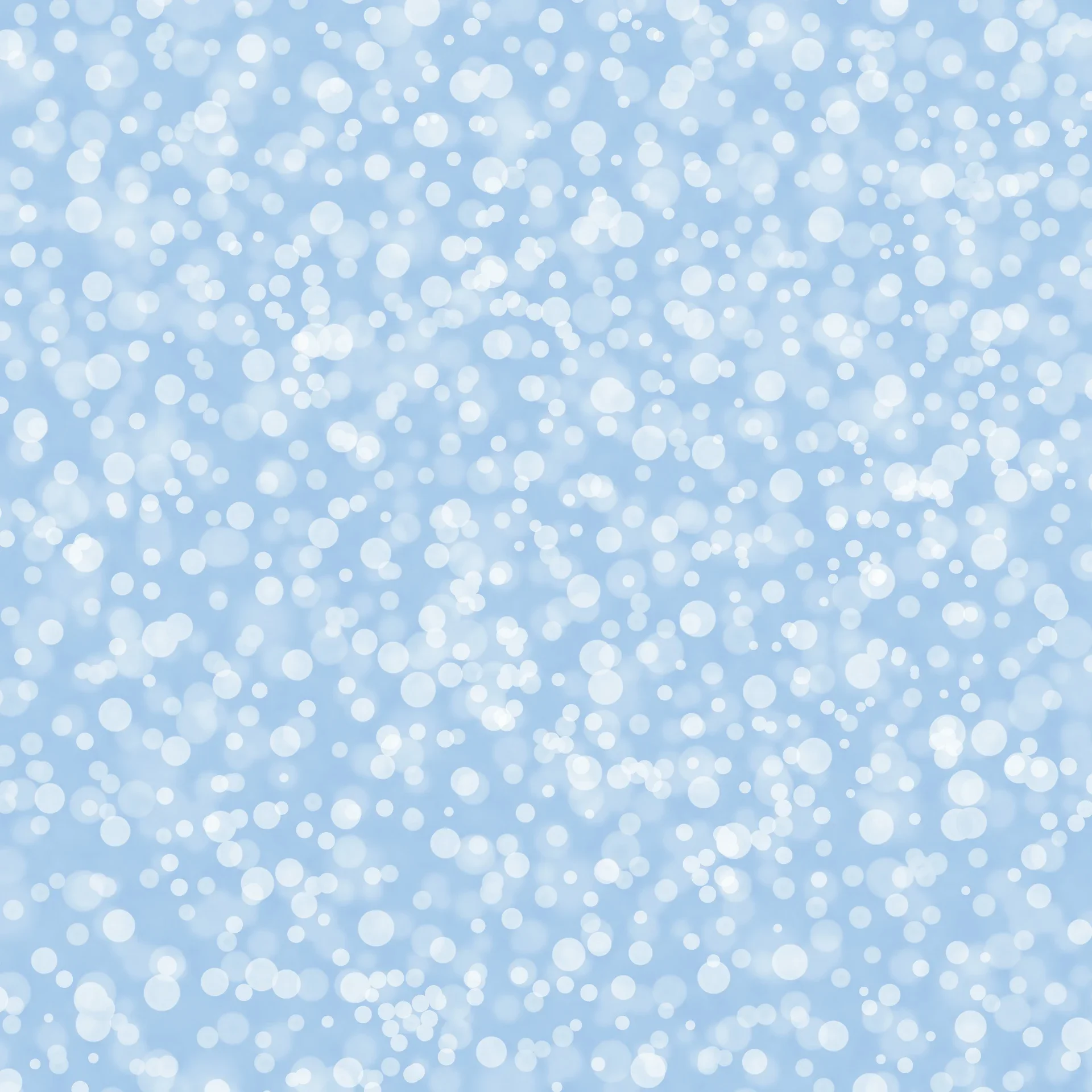Background of white bokeh lights on a light blue background.