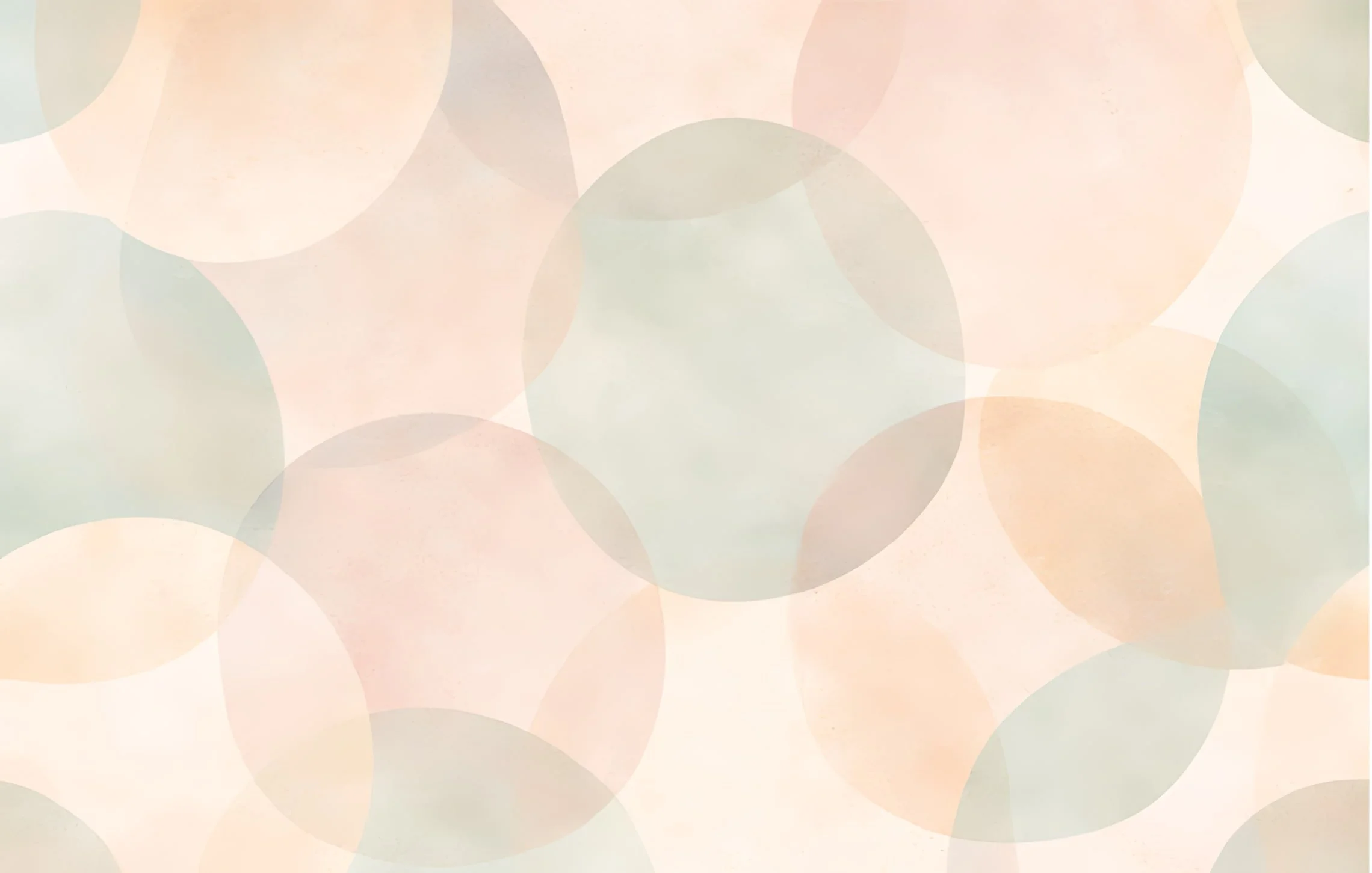 Abstract pattern of overlapping semi-transparent circles in pastel shades of pink, green, beige, and light orange.