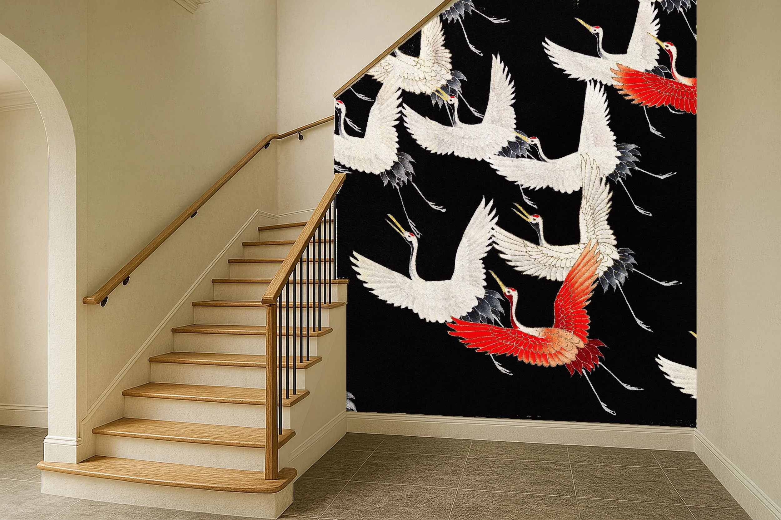 A staircase next to a wall with a large black mural of flying red and white cranes.