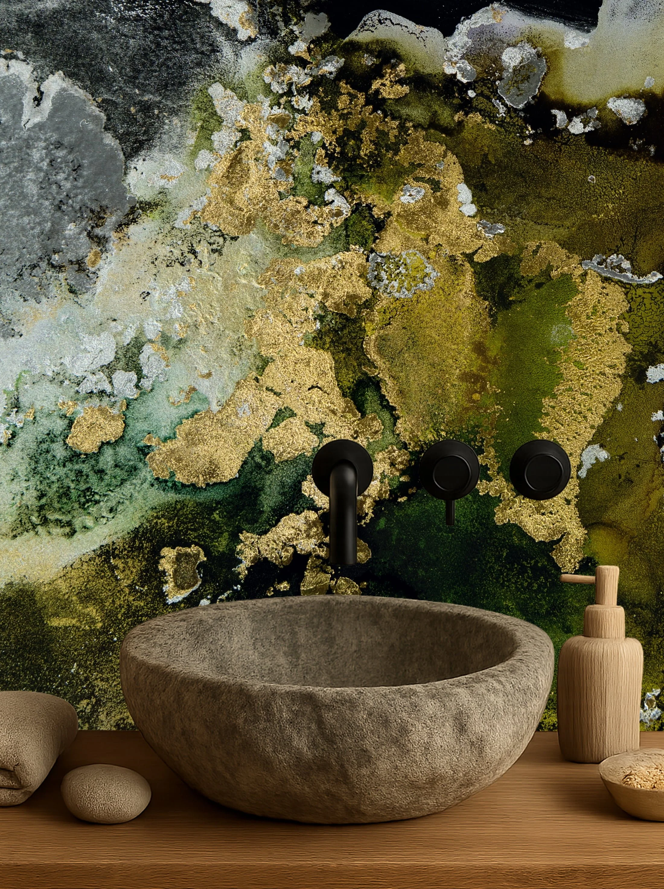 Colorful abstract nature bathroom wall mural wallpaper with green gold gray black tones behind stone sink and black faucet – Pop Papel artistic seamless wallcovering