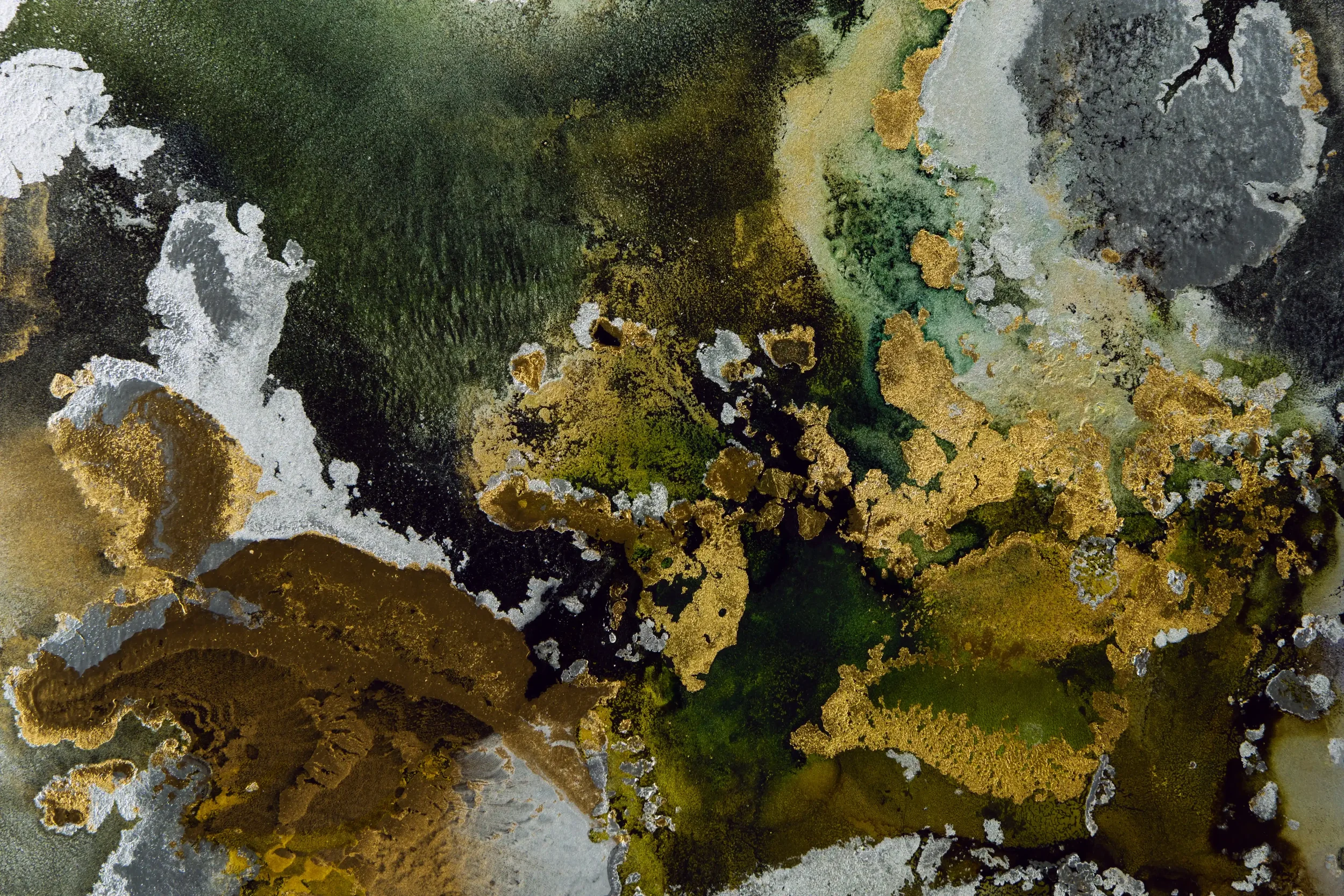 Abstract painting with swirling patches of dark green, gold, black, white, and gray colors scattered throughout the image.