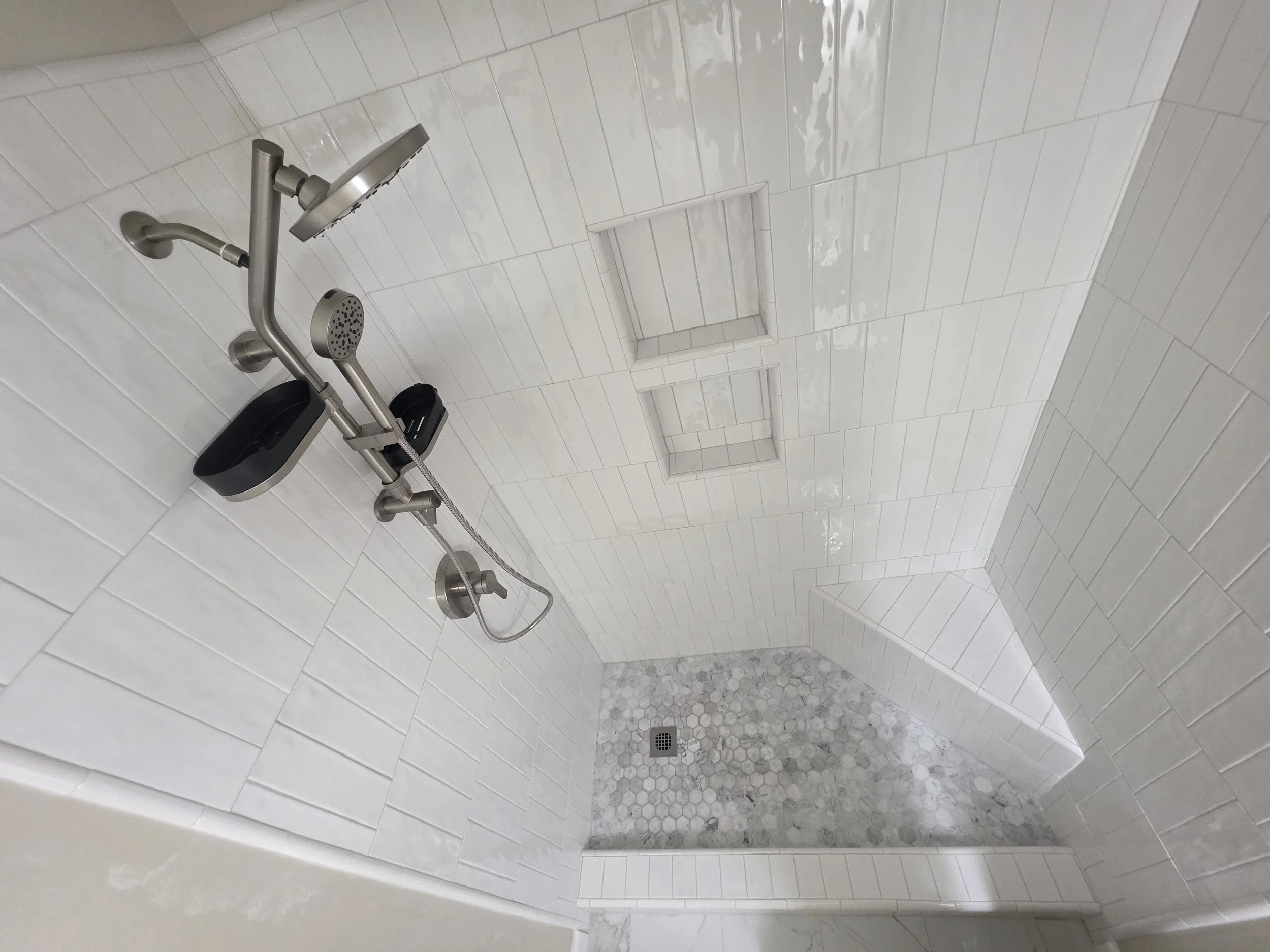 Custom tile shower with HydroRail shower system and mosaic tile floor in Greensboro, NC