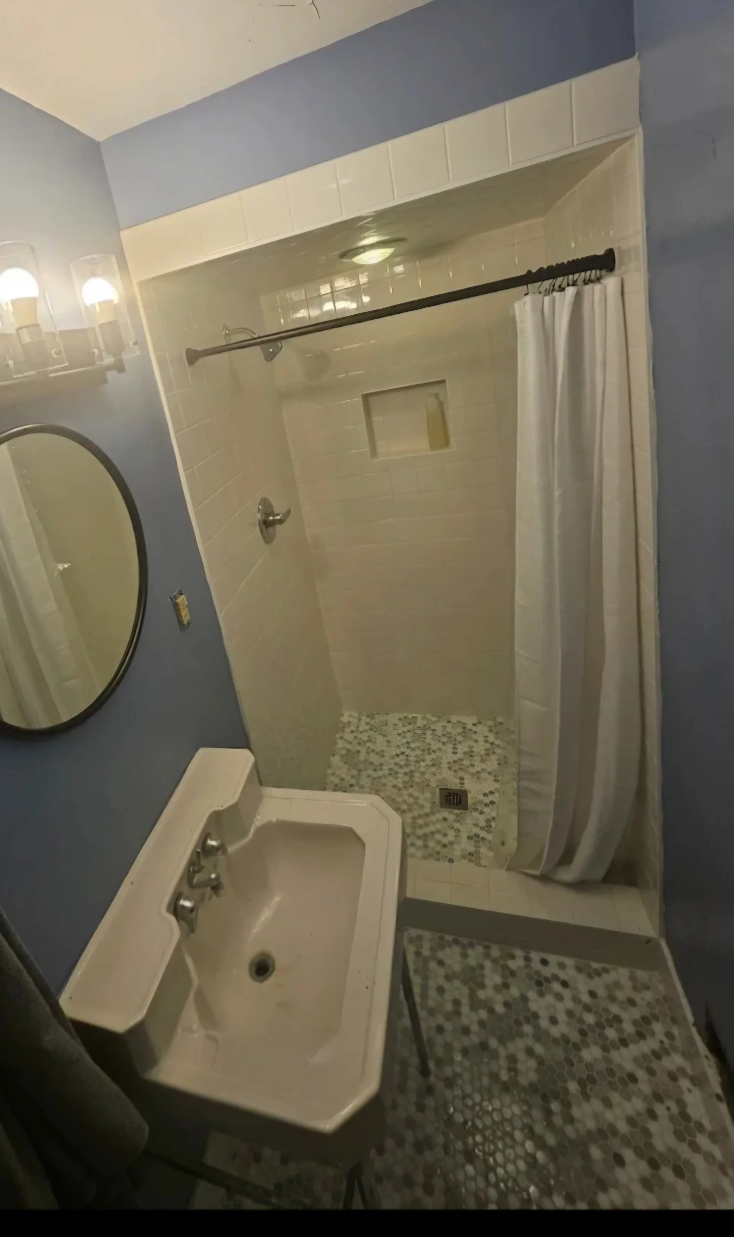 Finished custom tile shower shown as part of the completed bathroom in Greensboro, NC