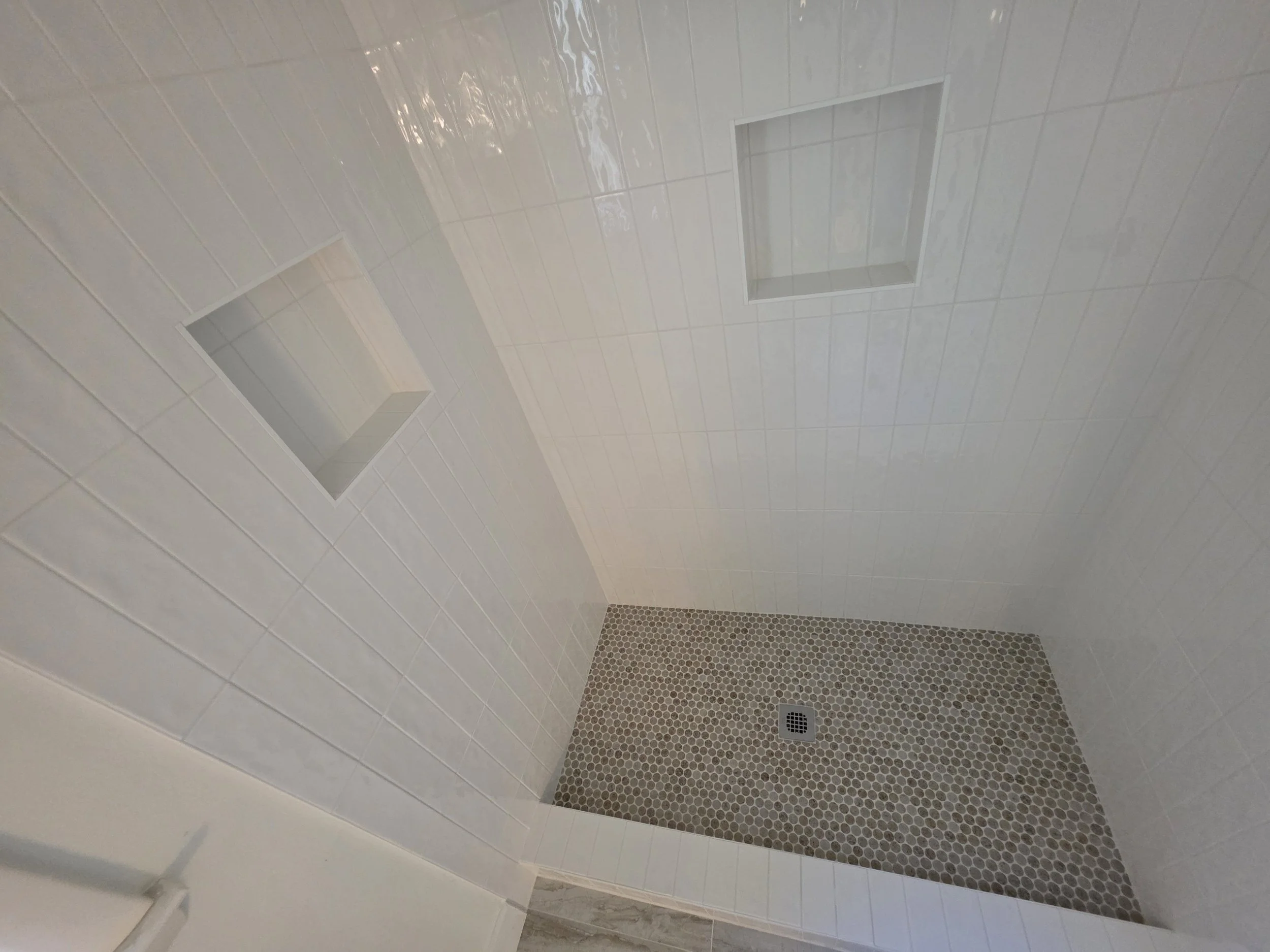 Custom walk-in tile shower with mosaic floor in Greensboro NC