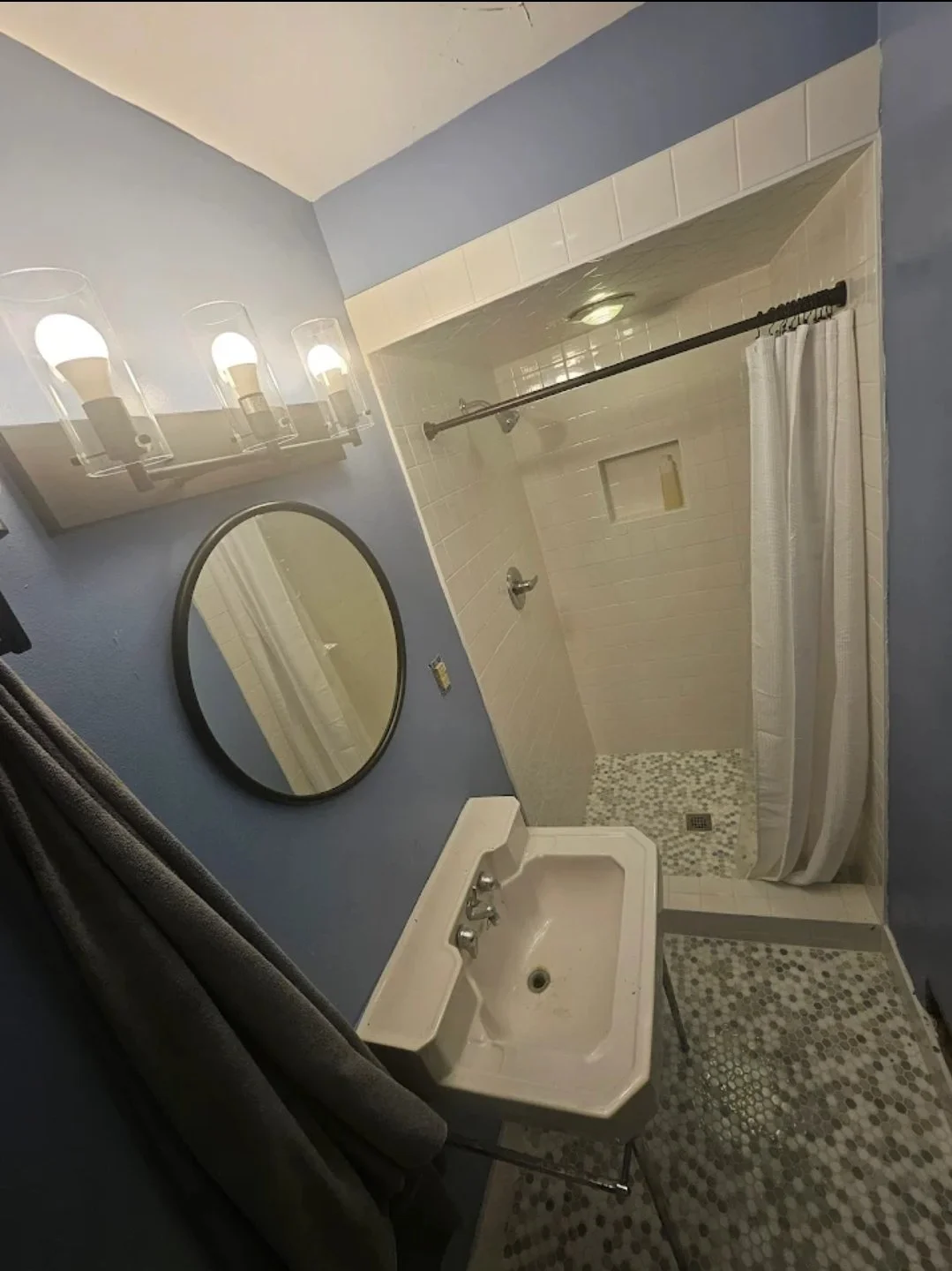 Bathroom remodel with tile shower and recessed niche shelving in Greensboro NC