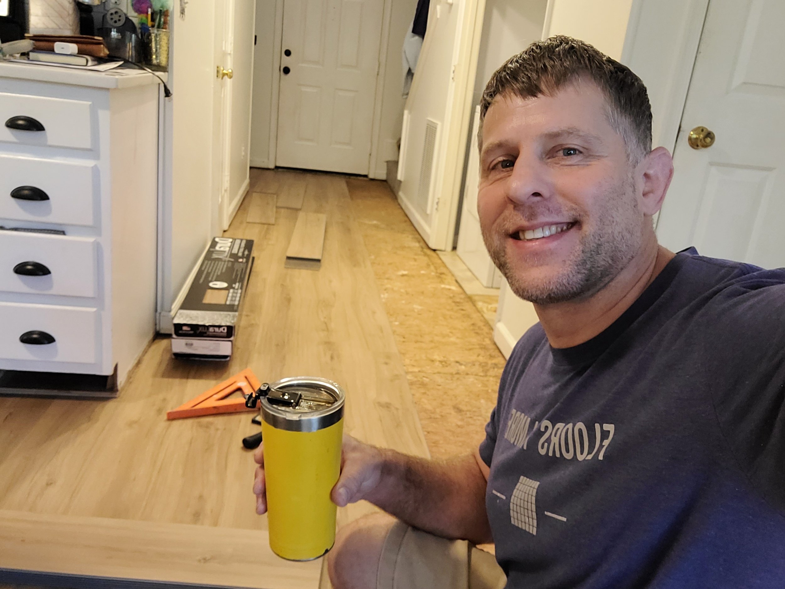 Residential flooring project in progress with tools and materials on site in a home in Greensboro, North Carolina