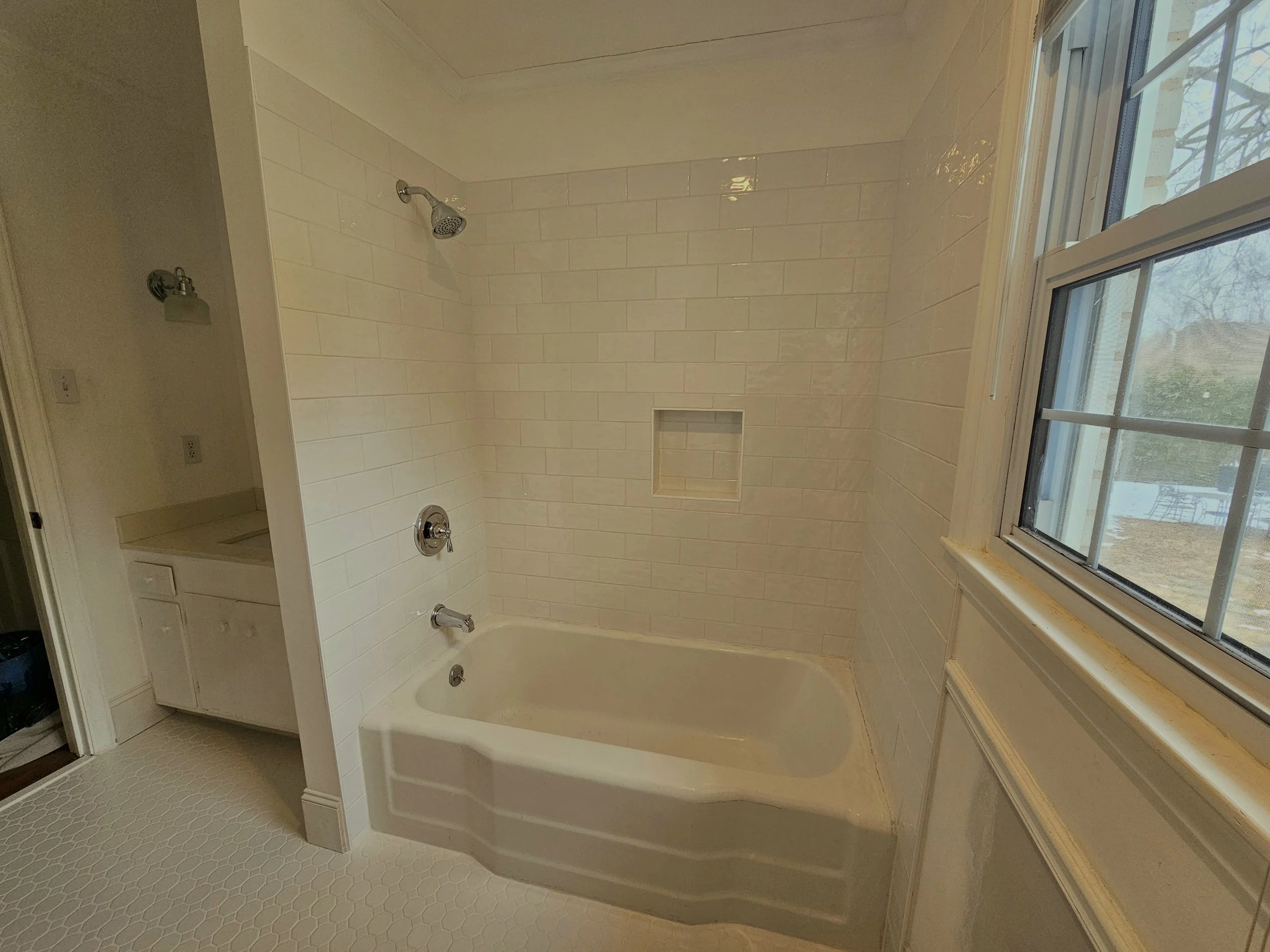 Bathroom remodel with custom tile tub surround in Greensboro NC
