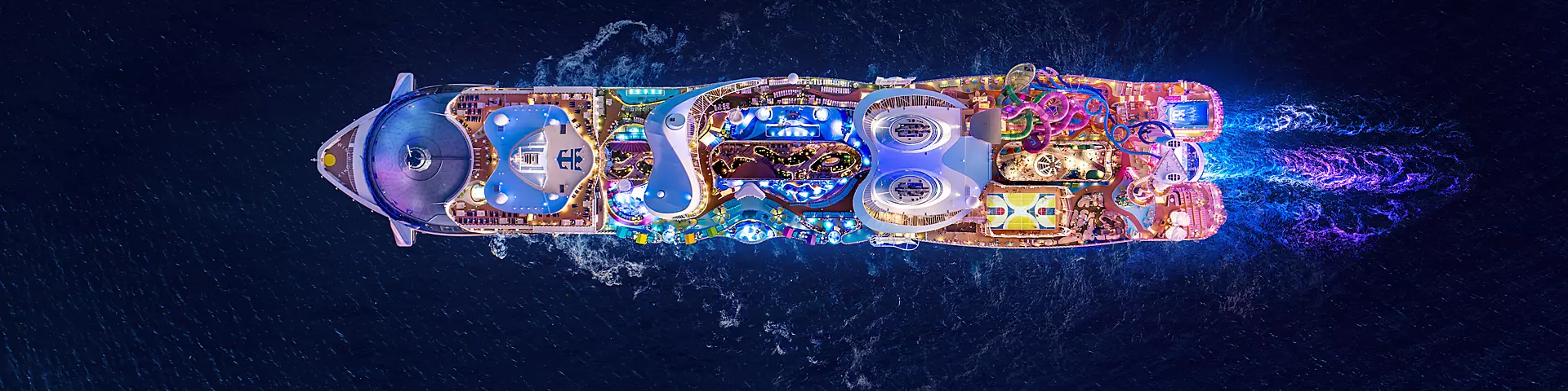 star-of-the-seas-aerial-full-ship-sailing-night.png