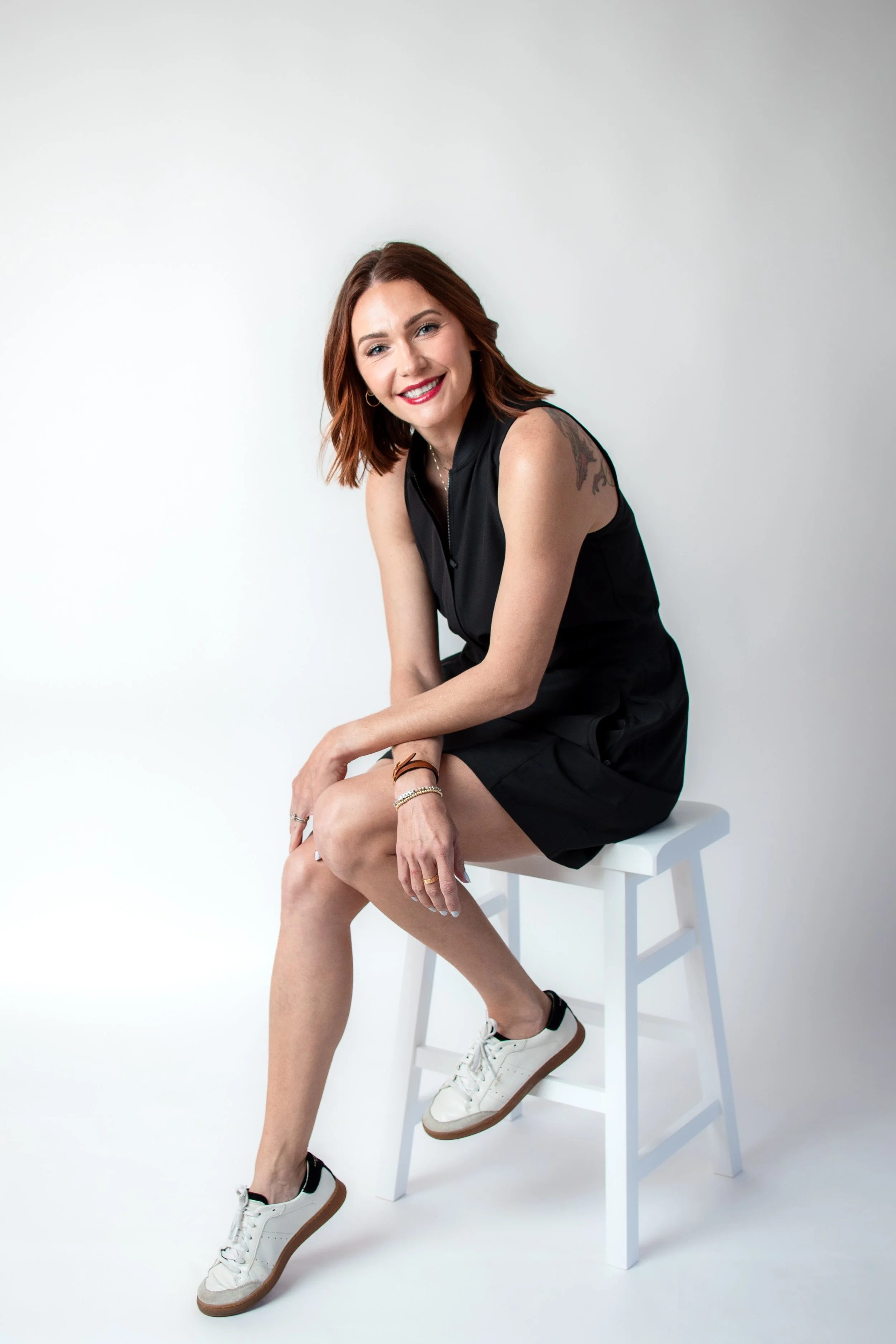 Makeup artist on stool