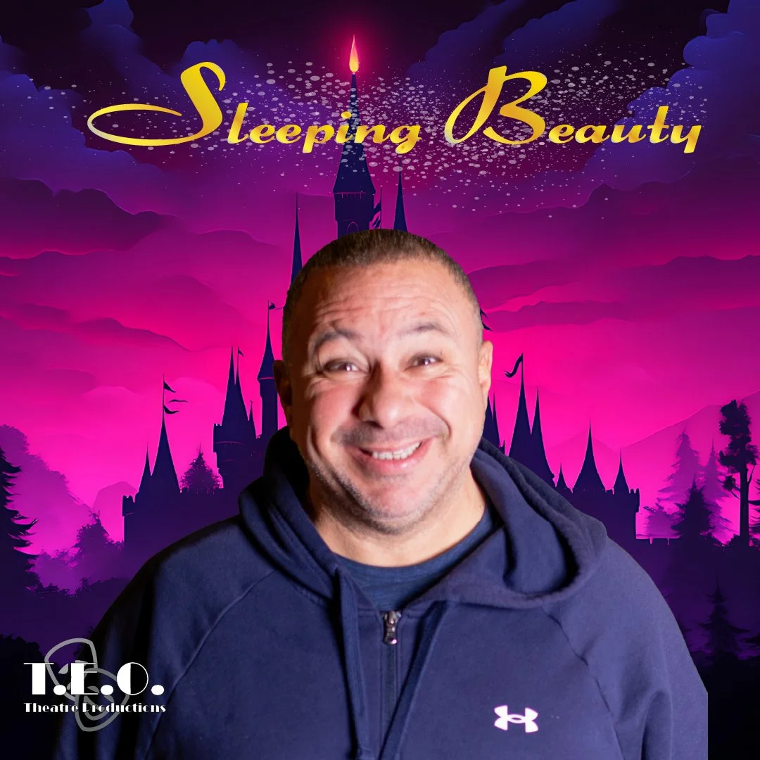 A man with short dark hair smiling in front of a digital backdrop that resembles a pink and purple castle scene with the words 'Sleeping Beauty' in yellow cursive font at the top. T.E.O. Theatre Productions logo is at the bottom left.