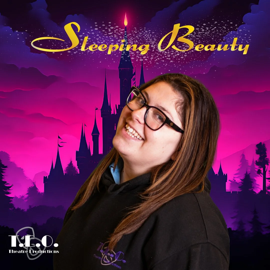 A smiling woman with glasses, wearing a black hoodie, standing in front of a colorful background with a purple and pink castle silhouette, clouds, and stars, with the text 'Sleeping Beauty' at the top.