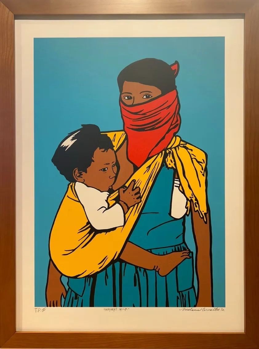 A colorful illustration of a woman and child, with the woman carrying a baby in a yellow sling. The woman wears a red bandana covering her face, and all are depicted with dark hair and skin. The background is blue, and the illustration is framed.