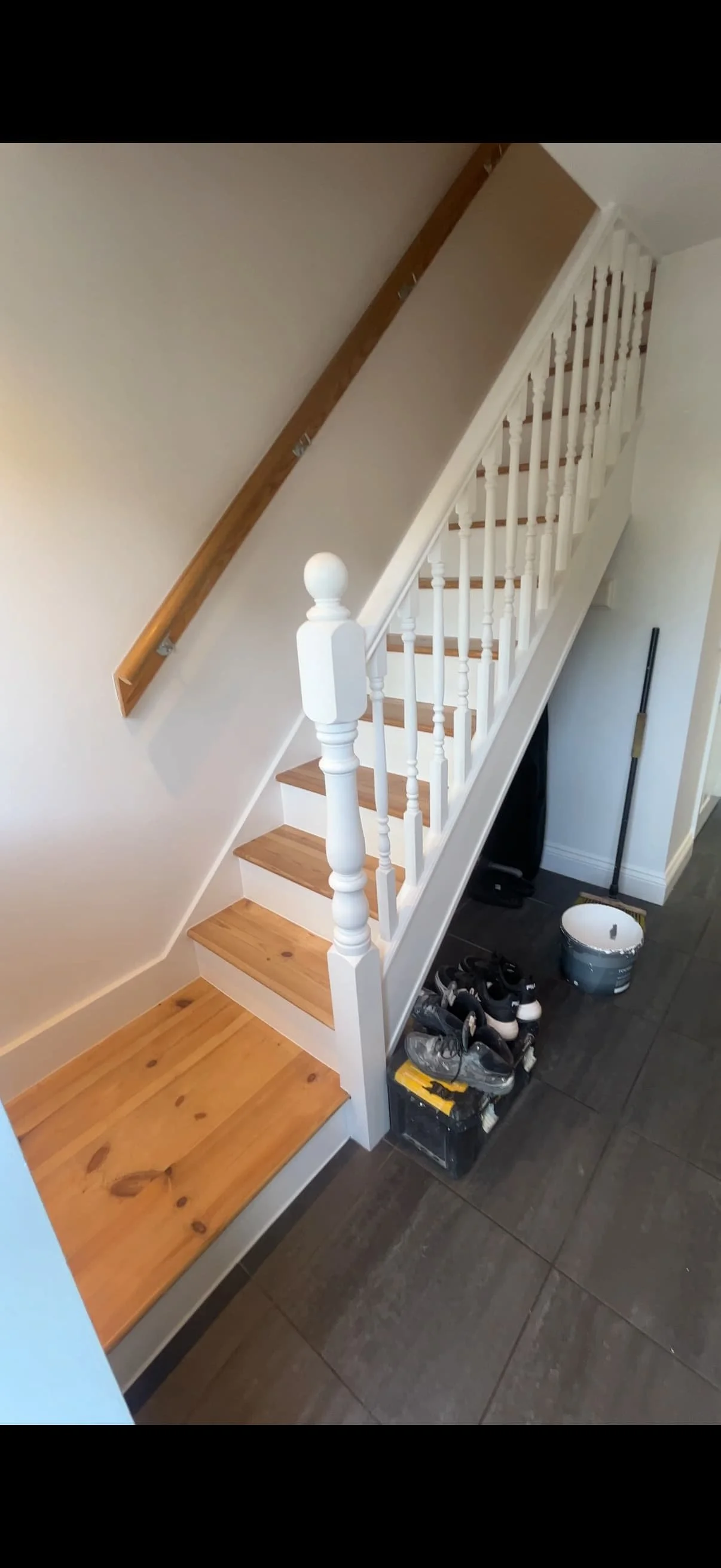 Painted white staircase with restored timber treads in Harpenden, Hertfordshire
