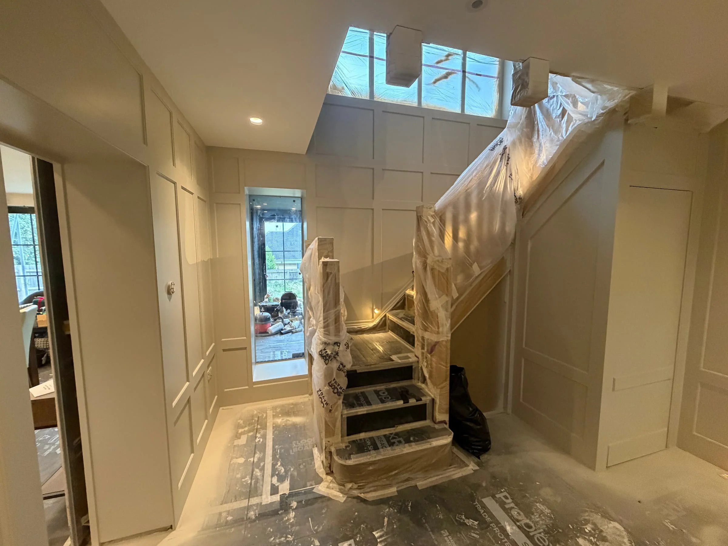 Spray-painted custom wall panelling and fitted joinery in Harpenden, Hertfordshire
