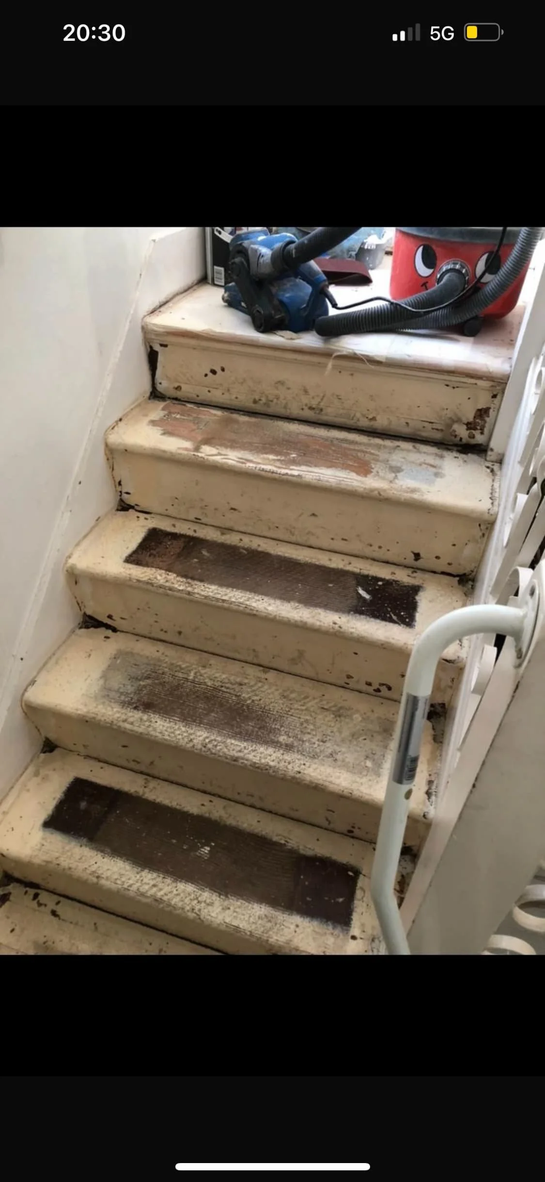 Worn painted staircase before timber restoration and decorating work in St Albans, Hertfordshire