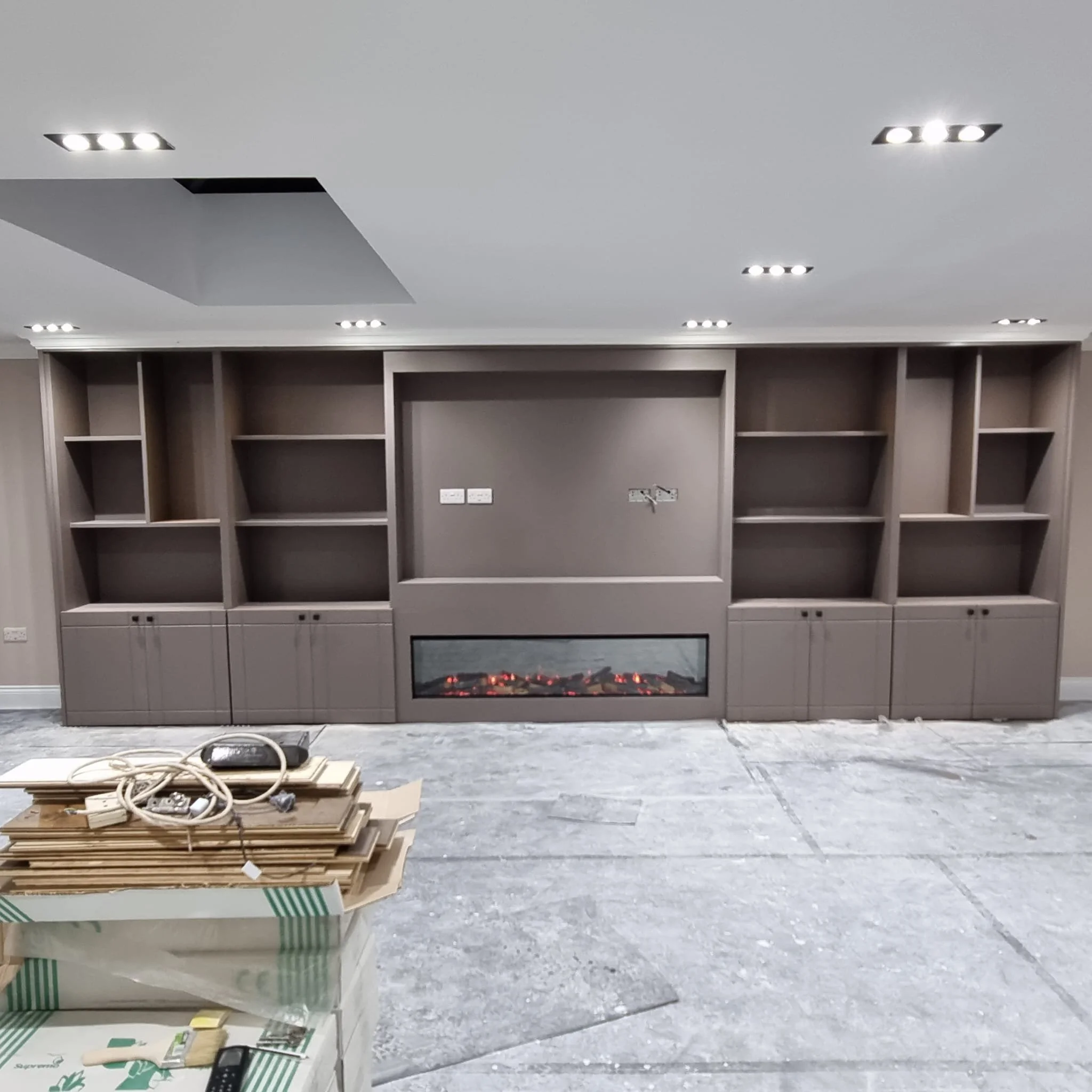 Spray-painted bespoke fitted cabinetry and shelving in St Albans, Hertfordshire
