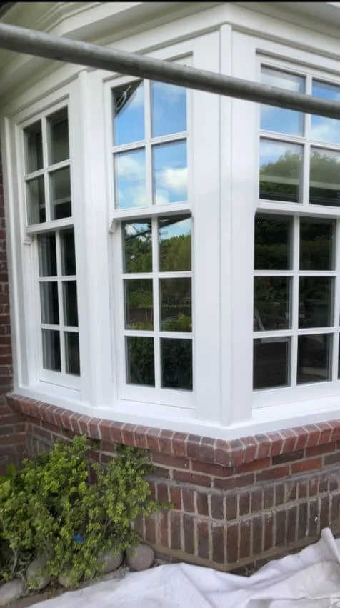 Restored and repainted timber sash windows after repair in St Albans, Hertfordshire