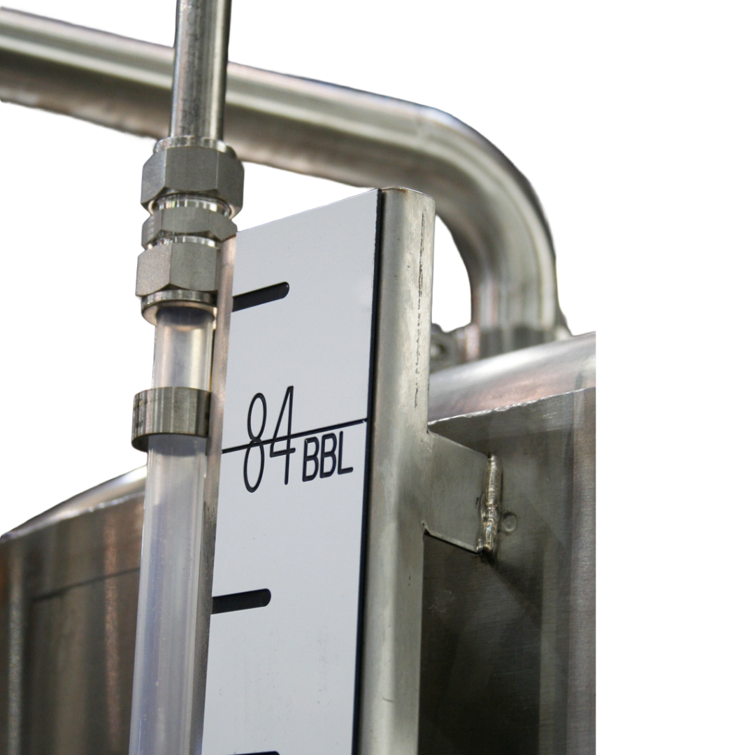 A brewery tank with an attached sight tube assembly with a calibration strip indicating the tank liquid volume.