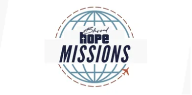 Logo for a church called Hope Missions with a globe graphic and stylized text.