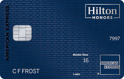 A Hilton Honors loyalty program card with a member since 2016 designation, American Express branding, and a blue background with overlapping 'For the Stay' text.